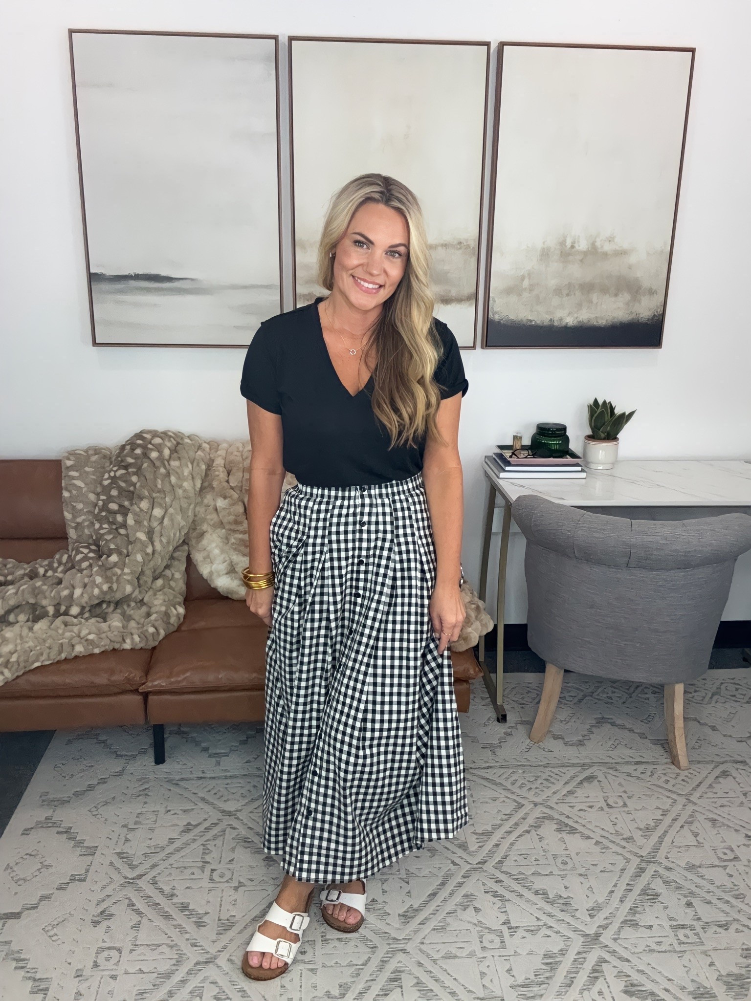 This gingham midi skirt does all the work, so I kept everything else simple. A black tee and comfortable sandals make it easy to wear now, then I’d switch to loafers and a lightweight sweater for fall.

gingham midi skirt, black tee outfit, transitional style, fall skirt outfit, business casual outfit, workwear style, black and white style, midi skirt outfit, early fall fashion, office style, AudrieDollins

#LTKootd #LTKSeasonal #LTKOver40