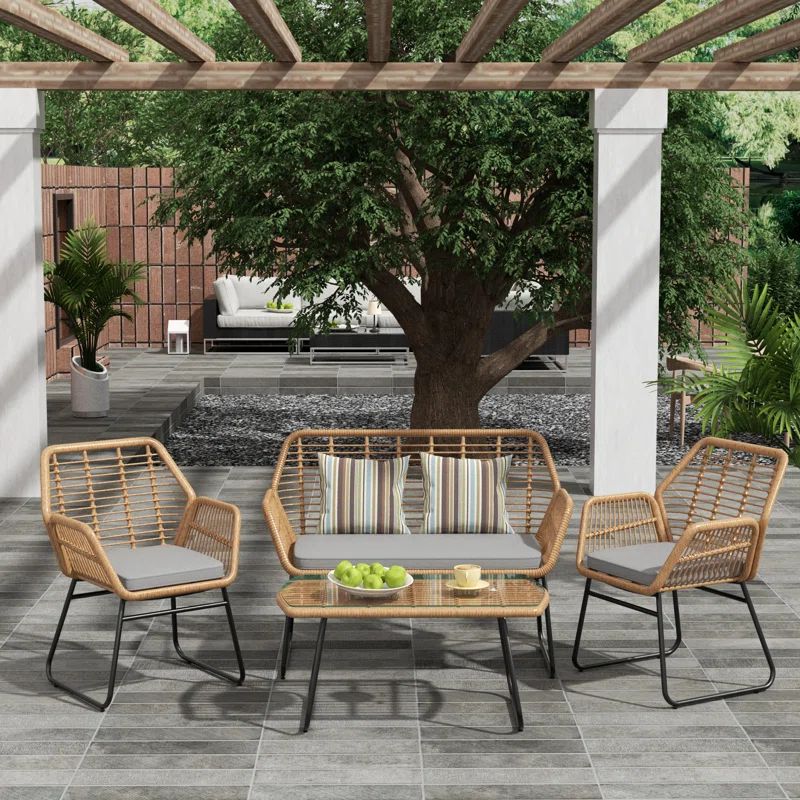 Evins 4 Piece Rattan Seating Group with Cushions | Wayfair North America