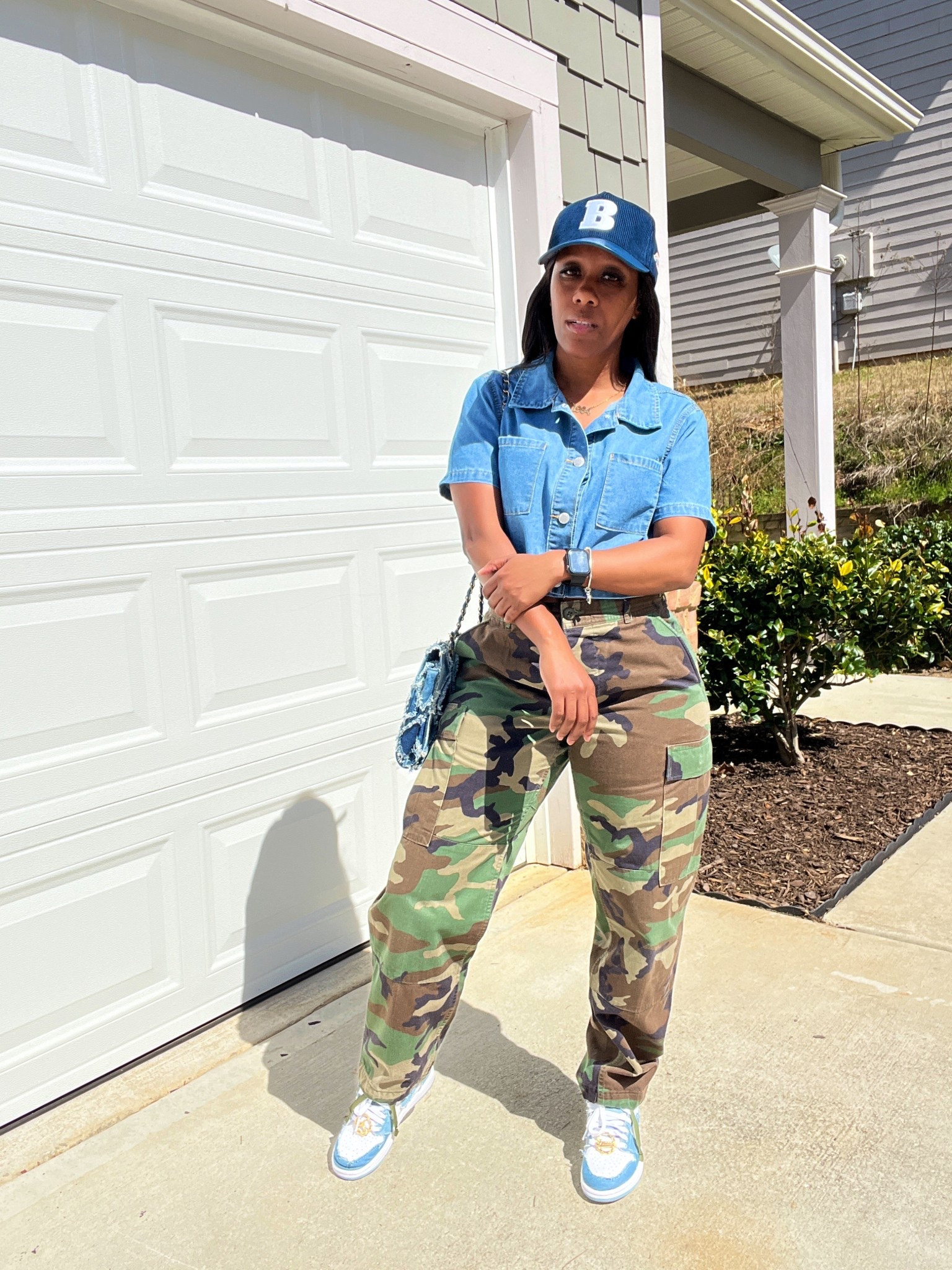 Styling camo pants for the spring. Styled with a cropped denim button-up, camo utility pants, denim bag, and Denim Jordan 1 for a laid-back look that still pops.

#LTKShoeCrush #LTKStyleTip #LTKFindsUnder100