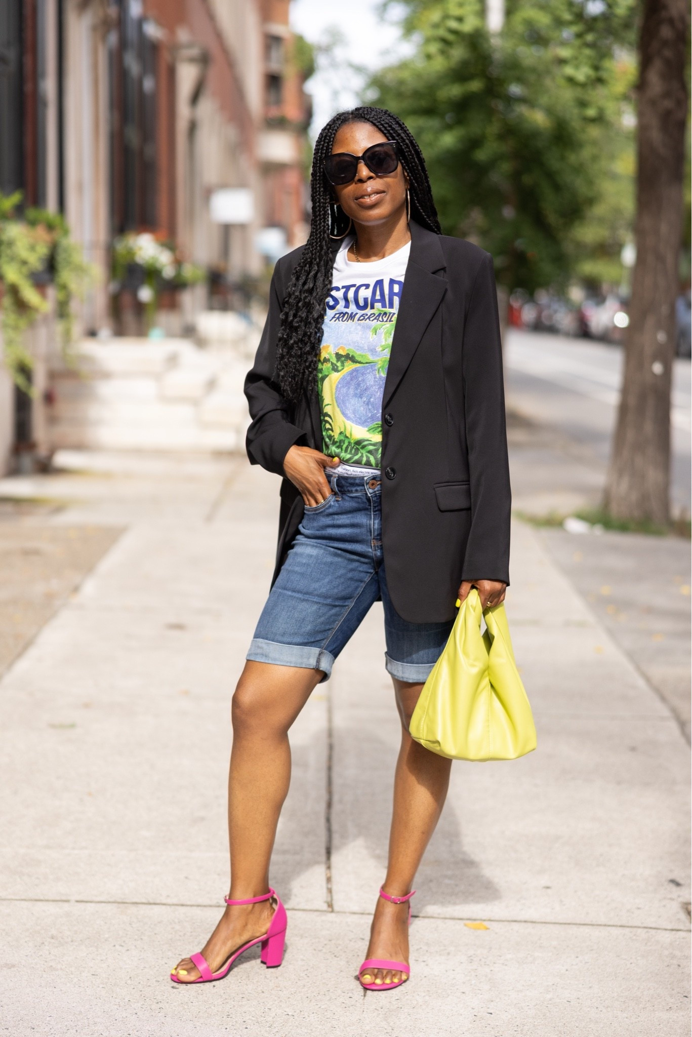 Graphic tees don’t always have to feel super casual. I layered this one with an oversized black blazer and denim shorts, then added bright heels and a colorful bag to bring everything together.

I love how the blazer gives the outfit a little more structure while the tee keeps it relaxed and fun. I linked the full look below.

#LTKU #LTKootd #LTKSeasonal