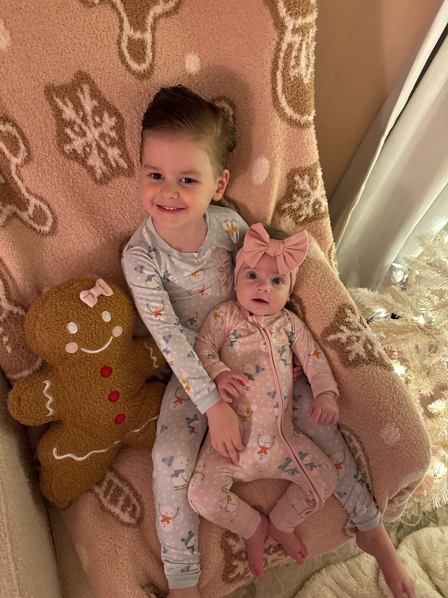 Pink and blue snowman jammies — on sale for black Friday! Use code BLACKFRIDAY for 30% off of all Tiny Jams!!! Some of our favorite pajamas are from them! 🥹🥹

Sales, toddler pajamas, baby zippy pajamas, bamboo pajamas, winter prints, siblings, matching 

#LTKBaby #LTKHoliday #LTKKids