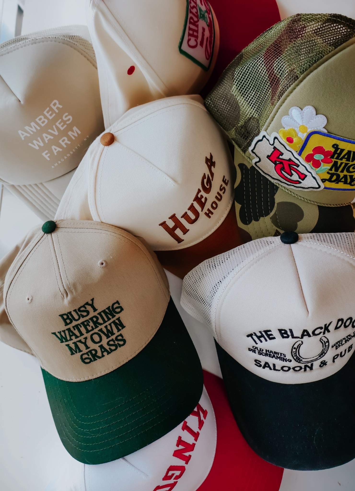 I’m a trucker hat girl through & through! Here are some of my current faves! 🧢🧢
•
•
The Amber Waves Farm hat is linked on my ShopMy! My Kingdom hat and Busy Watering My Own Grass hat are both from Shop Maddy Jae, a local boutique. These are currently sold out!  