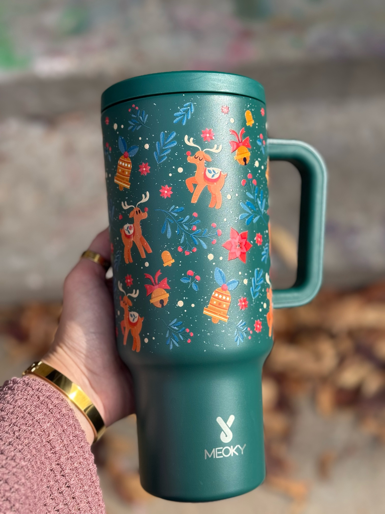 Juggling holiday chaos one spill-proof sip at a time. The cup's got it together... can't say the same for me. 🎅