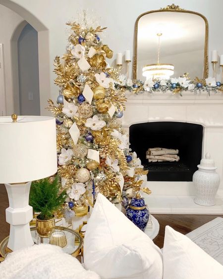Affordable Christmas tree and garland from Walmart🎄 White and gold Christmas tree with pops of blue ✨ holiday decor 

#LTKsalealert #LTKHoliday #LTKhome