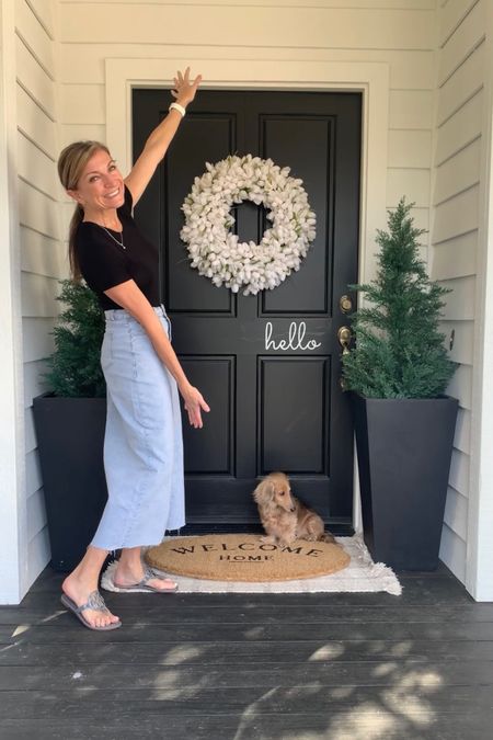 Refresh to the porch with tulip wreath, new welcome doormat, all with my planters, trees and layering rug. Also, found this cute Amazon jean skirt for only $25. I am wearing an XS. Great stretchy/think material! LOVE IT!

#LTKunder50 #LTKSeasonal #LTKhome