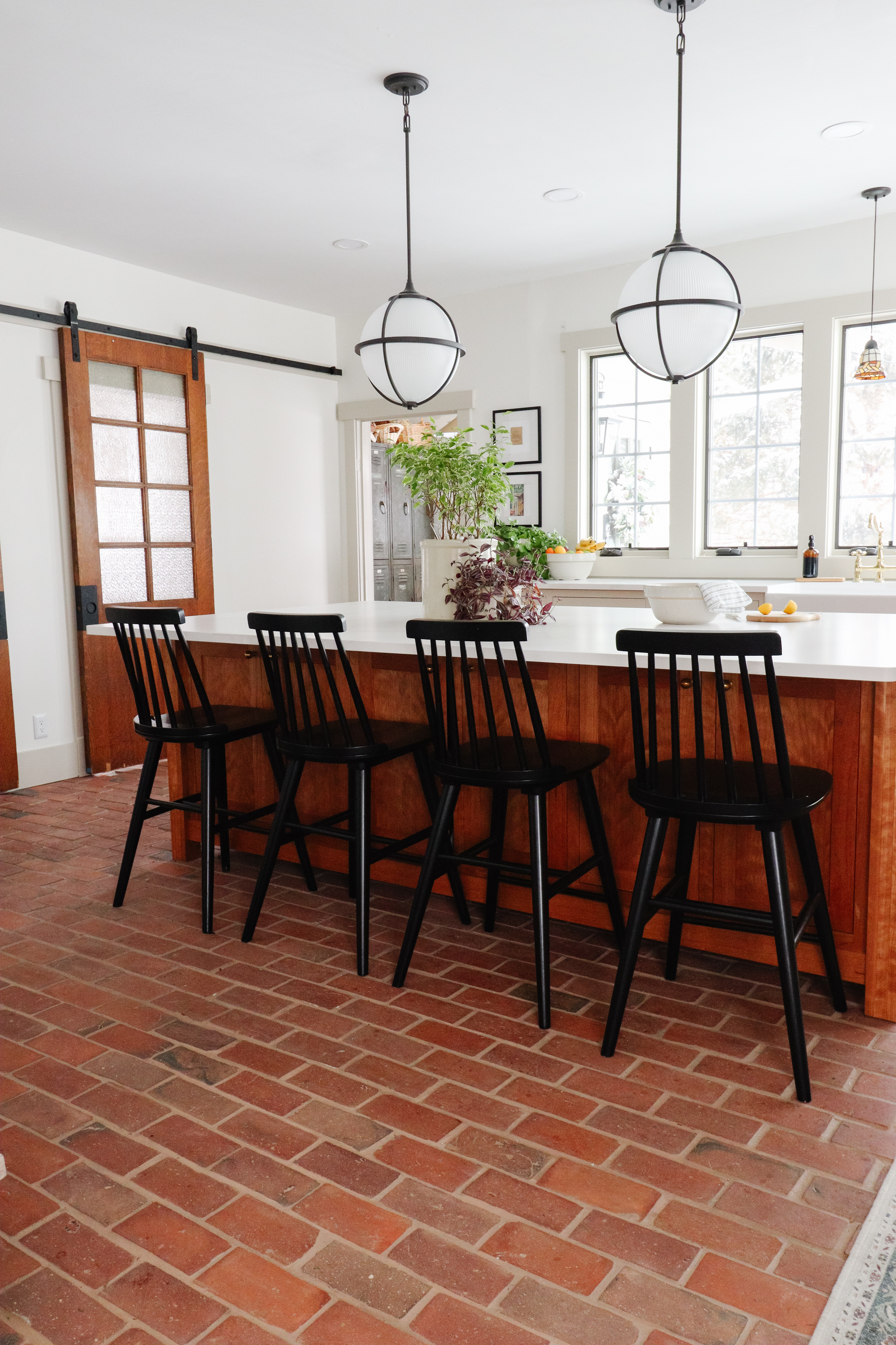Brick floors + warm wood + black accents = my kitchen combo 🤎🖤 

 #LTKHome