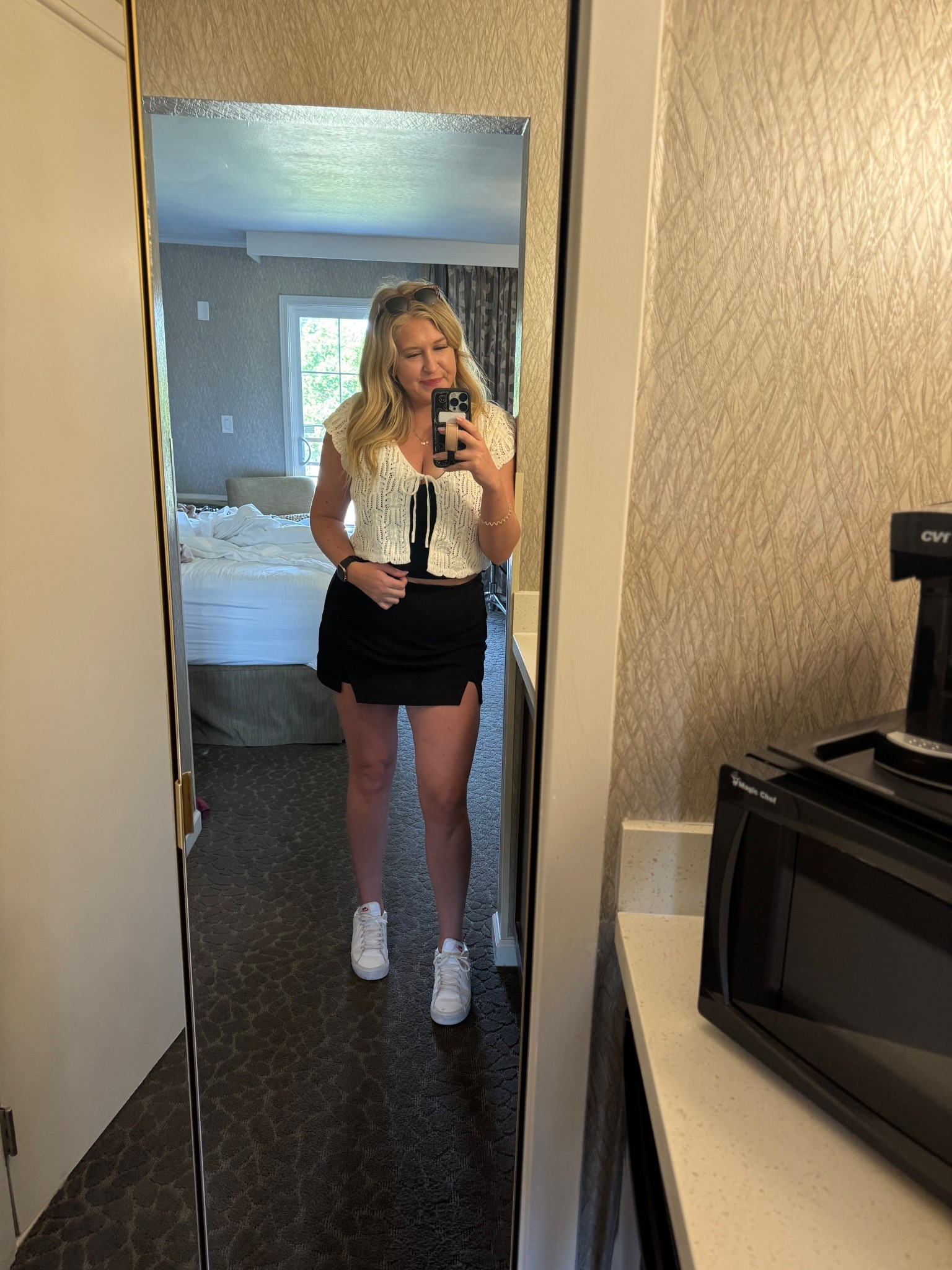 Concert outfit, summer outfit, country concert outfit, travel outfit, knitted top, tie top, skort outfit, crochet top, white sneakers, date night outfit, midsize outfit, size 12

#LTKMidsize #LTKSeasonal #LTKTravel