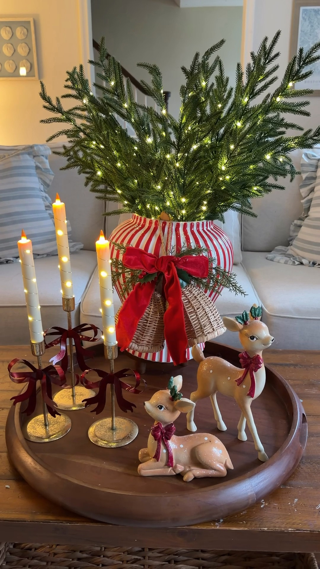 I love this trick of hanging decor from a vase with a spatula! These wicker bells look great with my fave new red striped vase!

#LTKSeasonal #LTKHome