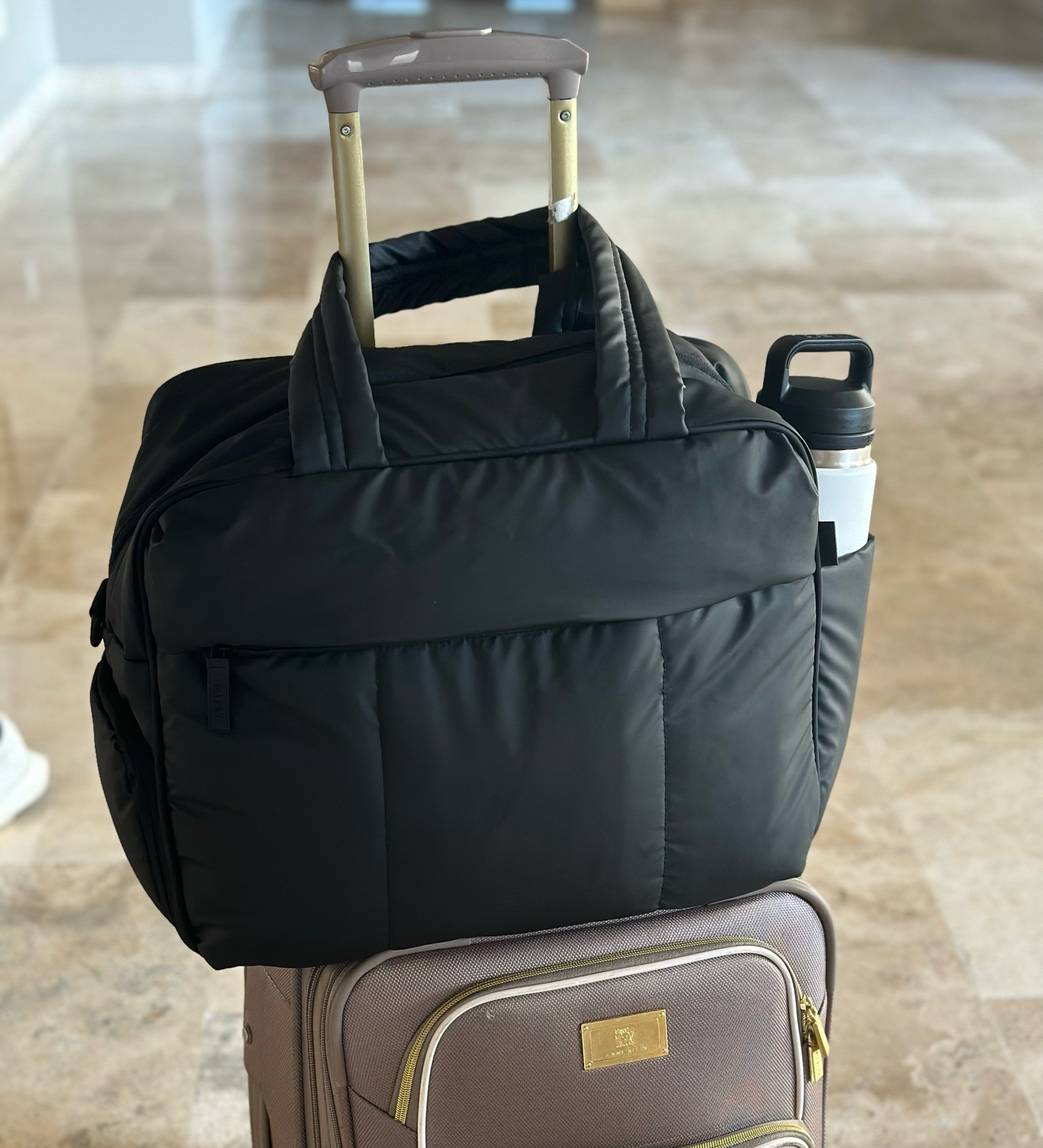 I finally bought the luka duffel and WHY DID I WAIT SO LONG!? You can fit so much in it, it has a detachable cross body strap, section for shoes, and so many pockets! I used as a carry on personal item but am already considering it for my hospital bag and maybe baby bag!

#LTKfamily #LTKitbag #LTKU
