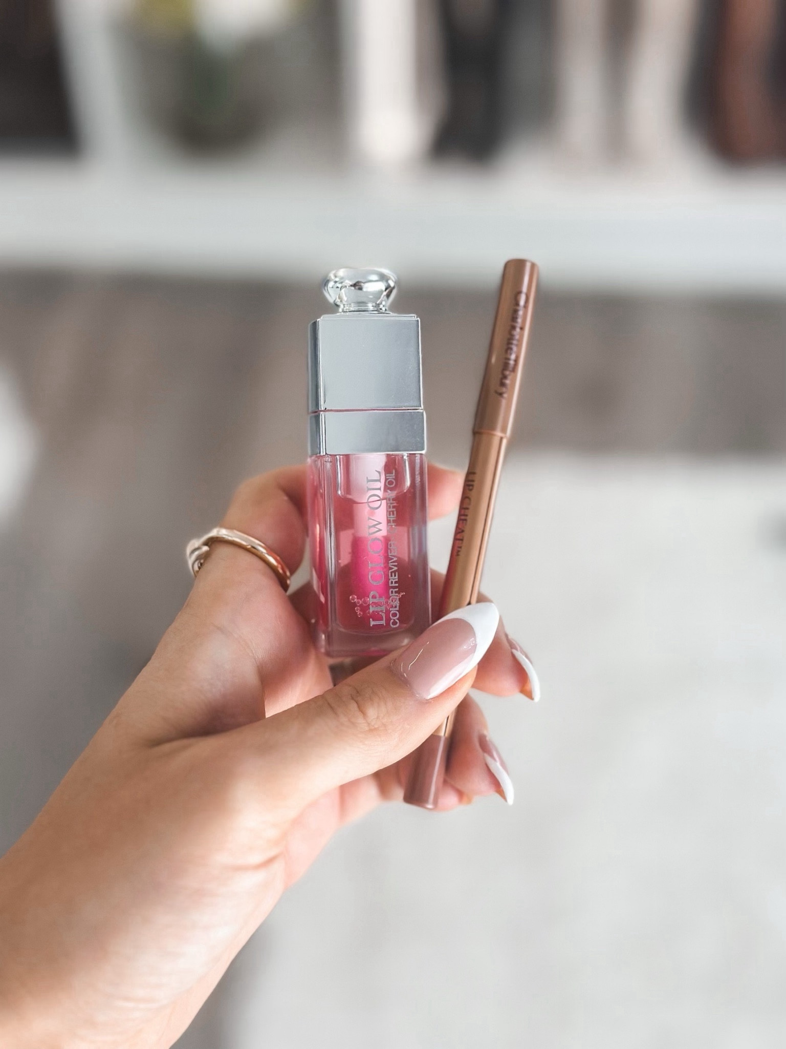 My favorite lip combo… it’s what I wear 95% of the time!! The Dior lip oil is 15% off right now! 
Shades listed below💕

Charlotte Tilbury Lip Liner- Iconic Nude
Dior Lip Glow Oil- 001 Pink


#LTKbeauty #LTKsalealert #LTKGiftGuide