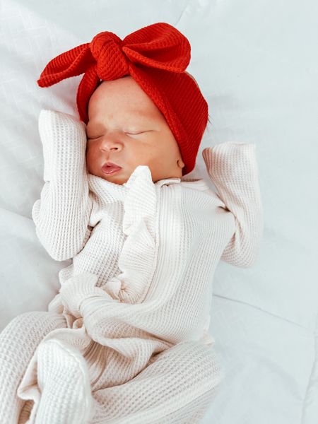 Newborn baby girl outfit. Organic ruffle romper and red bow. 

#LTKstyletip #LTKkids #LTKbaby