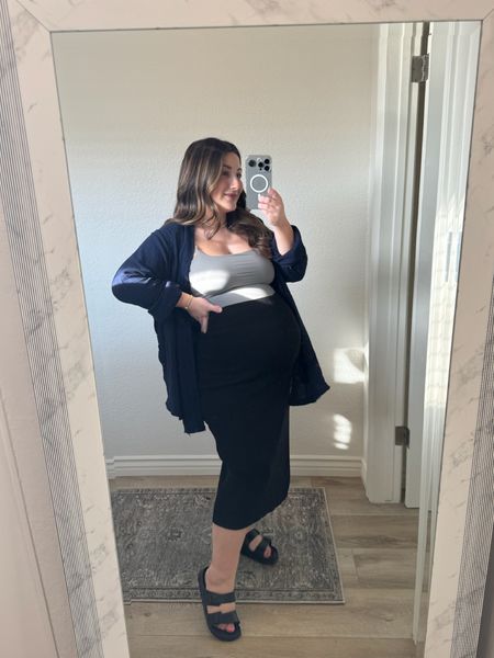 Softest and most comfortable outfit! 

Skirt size small (i wore a bunch before pregnancy and it is my most worn item during pregnancy!)

Buttery soft tank size medium

Button down size xs (runs big!)

Sandals runs true to size! 

Travel outfit, summer outfit, maternity outfit, petite style, petite midi skirt, sandals, casual loungewear 


#LTKBump #LTKFindsUnder100 #LTKStyleTip