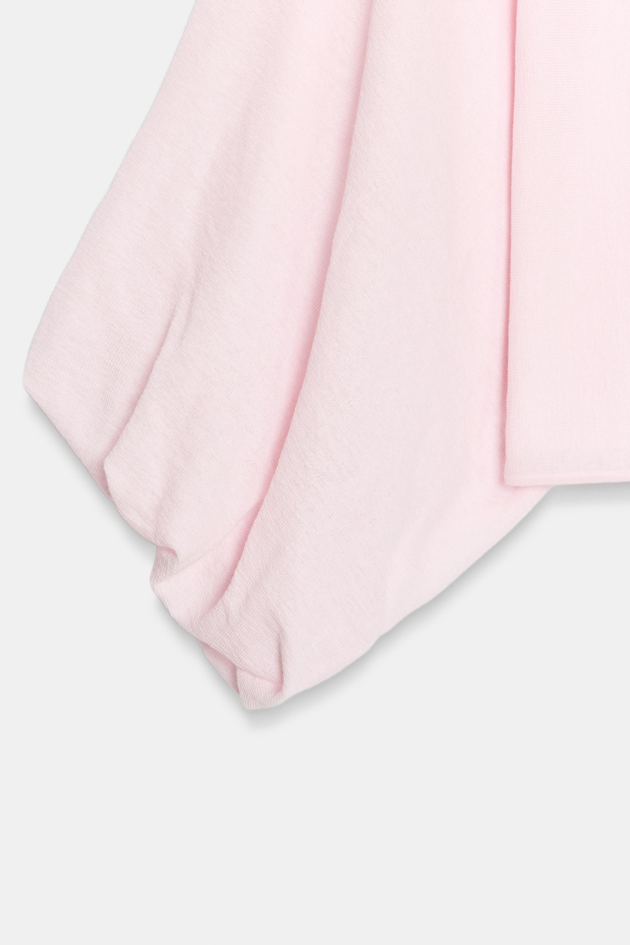 Boat neck jumper with long sleeves featuring wide armholes and cuffed hems. | Zara US