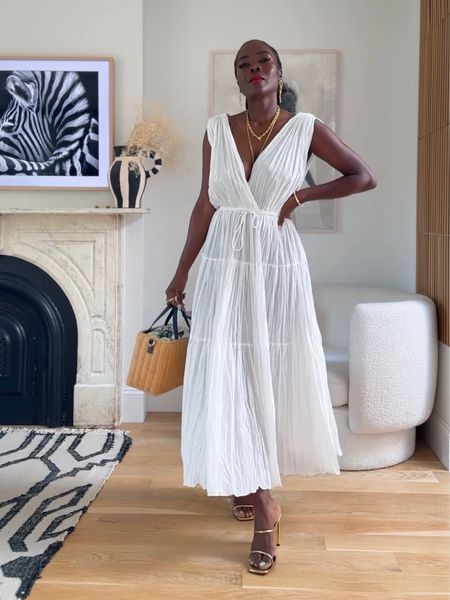 Travel style: white linen. 
This 100% cotton dress is perfect for any warm weather destinations. Best part, because it’s pleated/crackled, I pulled this straight out of my suitcase from trip to Seville, Spain 🇪🇸 and it didn’t need to iron/steam it. So it’s the perfect pack and go dress. #vacationoutfit #traveloutfit #summeestyle #vacaystyle #vacationoutfit #travelfashion #vacationstyle #travellook

#LTKstyletip #LTKtravel #LTKSeasonal