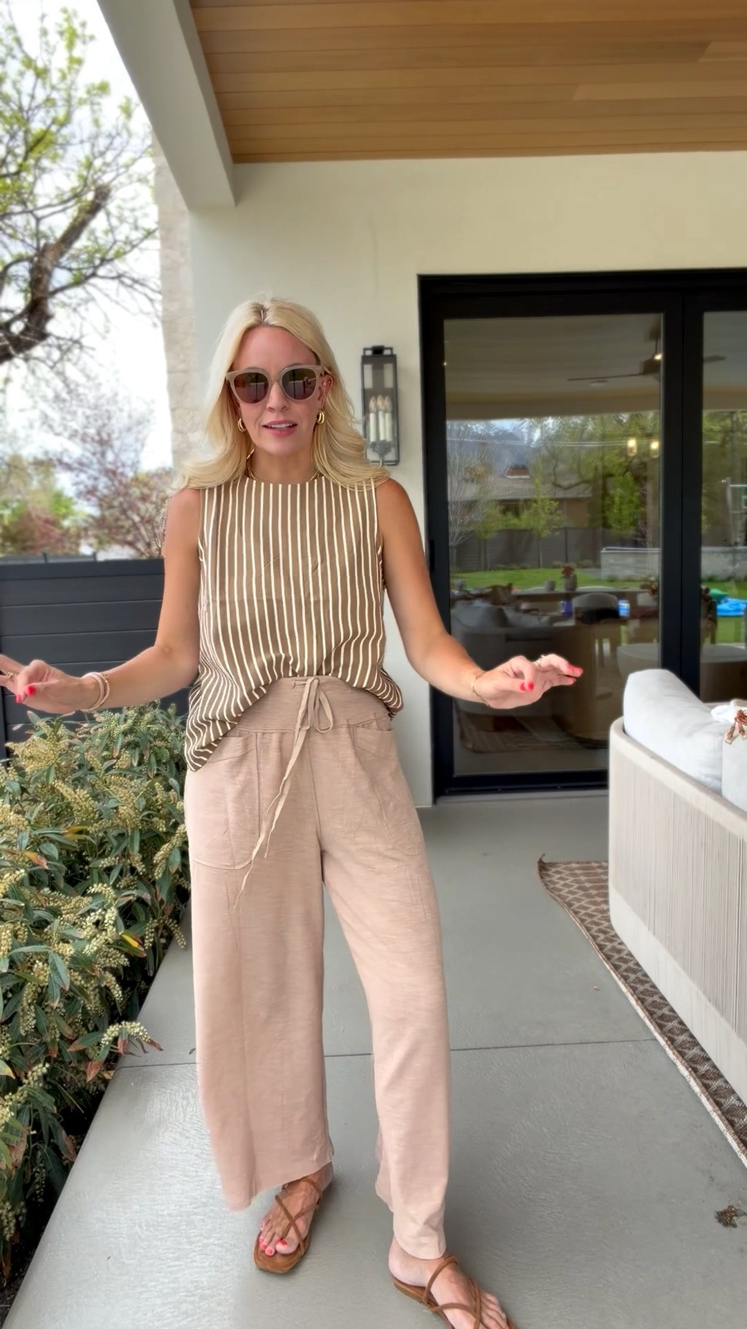 This tank is so cute and I love these pants! Both a size M

#LTKgrwm #LTKmomlife #LTKootd