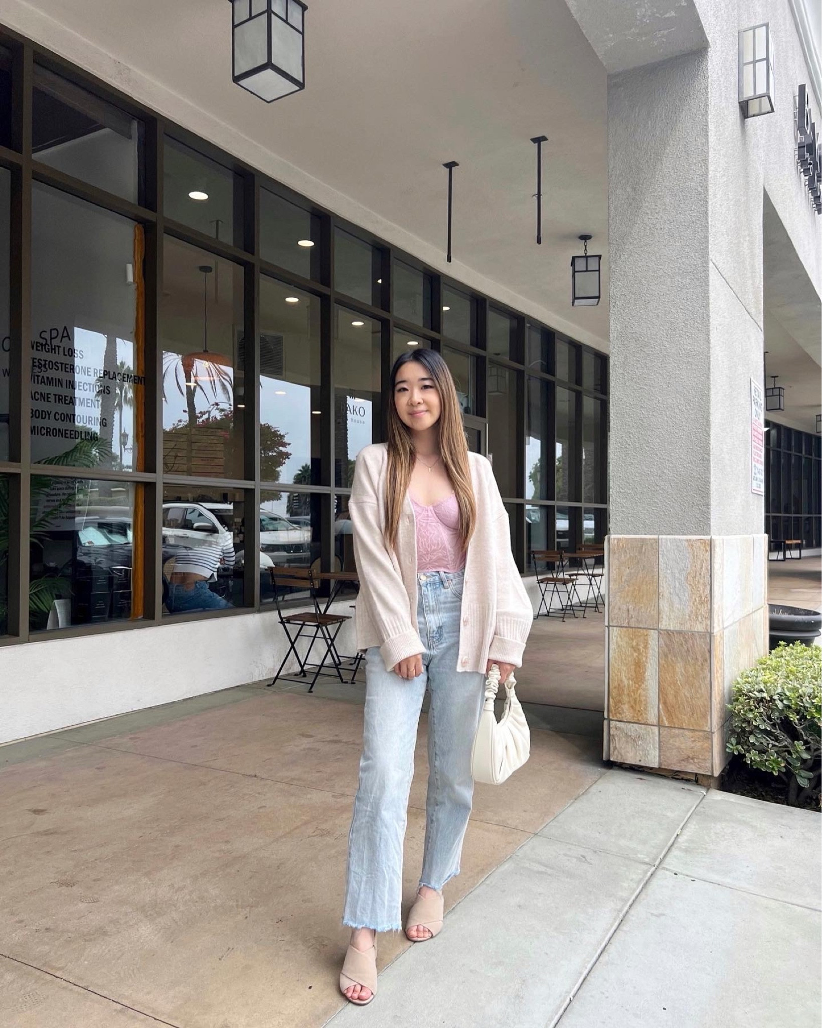 Minimal soft girl brunch outfit neutral fall spring fashion corset bustier cardigan denim jeans heels styling handbag 

#LTKfindsunder100 #LTKitbag #LTKstyletip