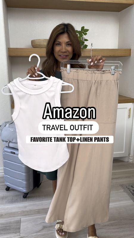 Travel outfit, airport outfit! Amazon’s summer’s best tank top and best linen pants! Ordered more colors in both. 
Tank top in small, color white; it is ribbed and not see through and you can wear regular bra. It’s stretchy and fits tts.
Linen pants in small, tts. Color Apricot. I’ve washed these pants in cold water in the washer and hung to dry and steamed: no shrinking! I looove! Great for travel, work, or casual.
Denim jacket in small. My fav and restocked! Also linking another one.
Sandals fit tts. One of my most worn sandals last spring and summer. I have it in black too. You can wear sneakers with this outfit too and linked Adidas Sambas that would look great.
The green dress at beginning of reel in small, tts, linked.
Puffer bag, light gray bag, and luggage are all linked as well! 
Travel outfit, airport outfit, Amazon finds, linen pants that are petite-friendly, casual dress, casual outfit, spring outfit, summer outfit, fashion over 40, outfit ideas, mom outfit, petite style. 


#LTKfindsunder50 #LTKVideo #LTKtravel