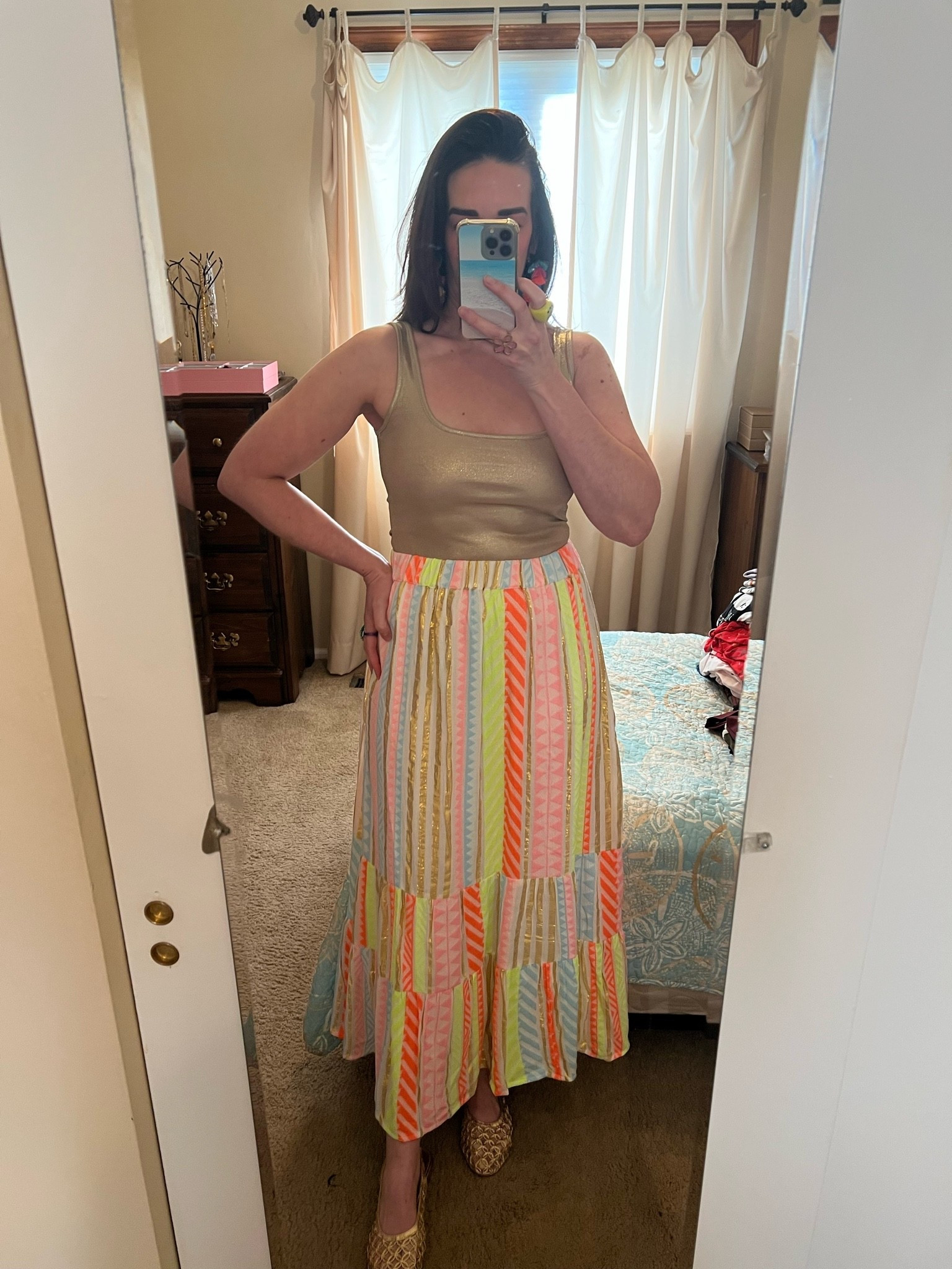 Gold metallic tank (s). Colorful striped maxi skirt (s). Gold weave ballet flats (9). #metallictank #goldtank #tanktop #skirt #maxiskirt #colorfulmaxiskirt #stripedskirt #goldflats #flats #balletflats

#LTKootd #LTKSeasonal