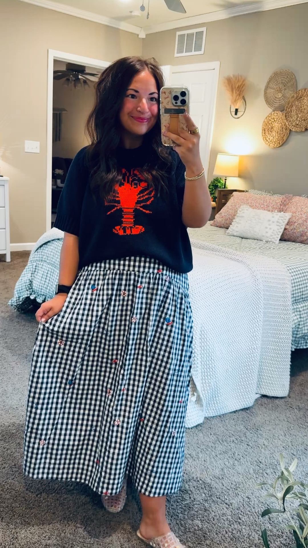 This outfit is giving all the coastal summer vibes! 🦞❤️ This adorable lobster short sleeve sweater paired with a classic gingham skirt is the perfect mix of playful and polished. Even better? Both pieces are from Walmart and budget-friendly! ☀️✨

jelly flats: fit true to size // wearing a 5
maxi skirt: fits oversized // wearing a 12
sweater tee: fits small // wearing an XL 

 #LTKootd #LTKMidsize #LTKWorkwear