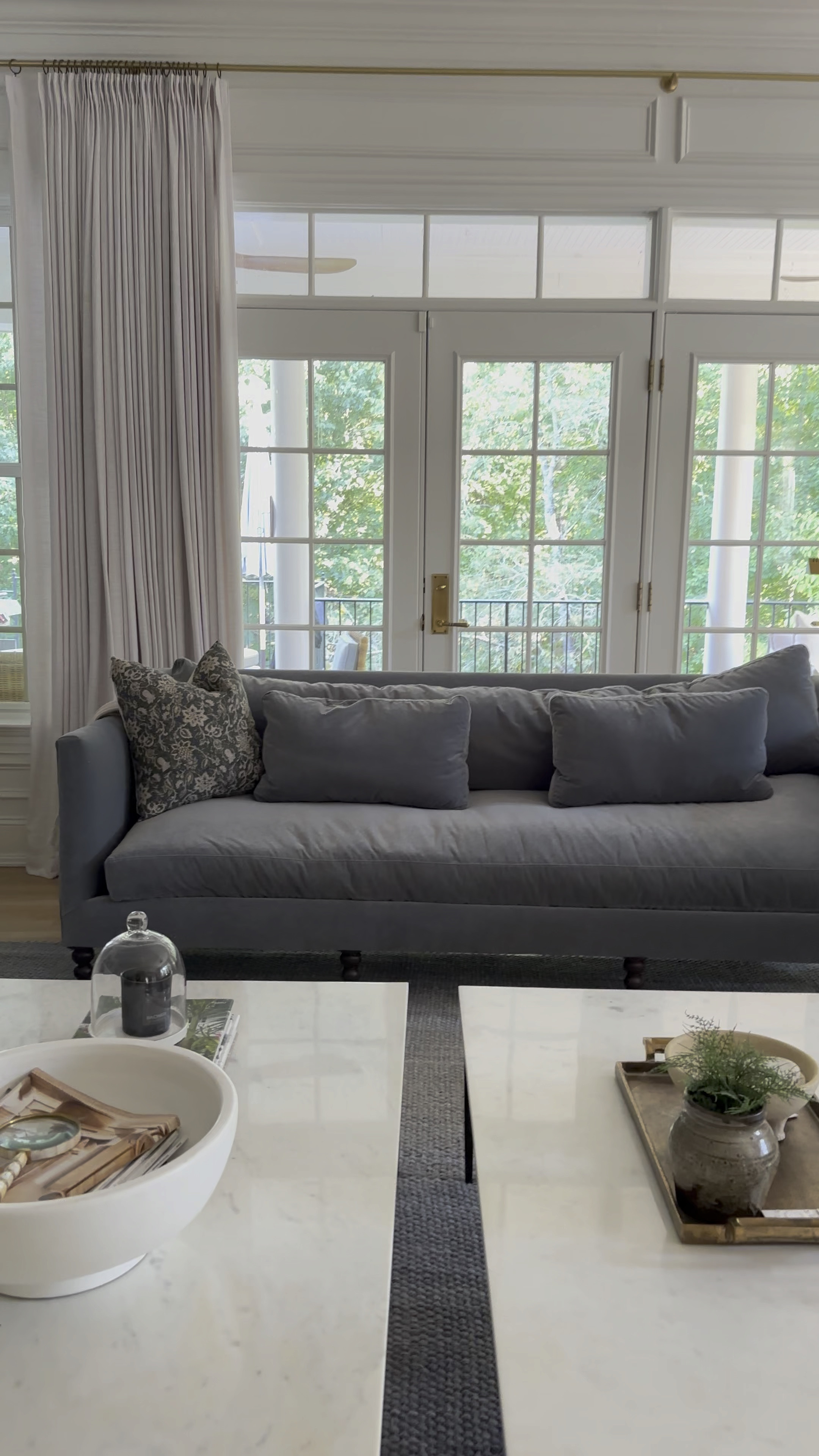 Madeline Slate Blue Upholstered Brown Wood Brass Casters Sofa - Large - 90"W 

We’ve had Madeline sofa in our living room for a while now and its SO COMFORTABLE I’d rather sit here than my Serena & Lily sofa. Flip the cushions every six months to keep them even.  

#LTKHome #LTKStyleTip #LTKSaleAlert