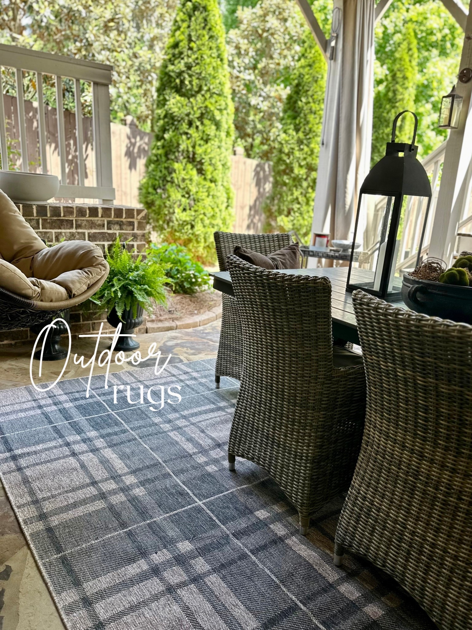 I want all of our outdoor areas to feel cozy and layered. This space is all about texture + neutrals.

I styled our covered patio with
woven dining seating, a neutral plaid outdoor rug, and soft greenery to make it feel warm and inviting year-round.

* outdoor patio furniture
* wicker chairs outdoor
* neutral outdoor rug
* patio decor ideas
* outdoor lantern decor
* backyard styling
* covered patio ideas
* porch decor inspiration
* outdoor entertaining space
* modern organic decor

#LTKSeasonal #LTKHome
