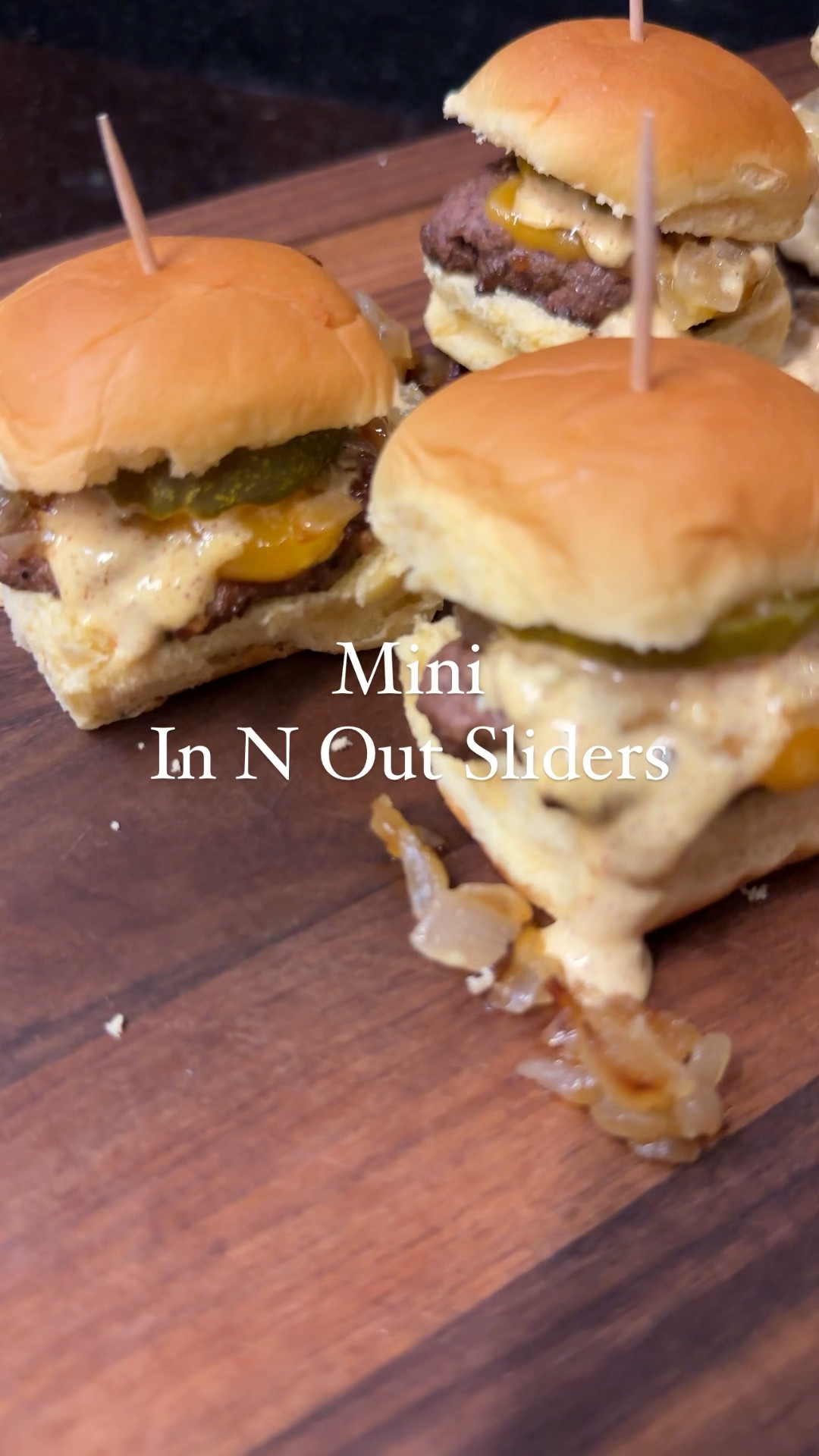 Mini In N Out Burgers 

Mini in n out burgers. 

12 Slider buns
1 pound Ground Beef
Steakhouse seasoning
1 Onion, medium
Olive oil
Salt
6 slices cheddar cheese, 
24 Pickle slices

Burger Sauce
1/2 cup mayonnaise
4 tbs dill pickle relish
2 tbs yellow mustard
2 tbs ketchup
1 tsp white wine vinegar
1 tsp onion powder
1 tsp garlic powder
1 tsp paprika

Start by prepping the grilled onions and burger sauce.
Finely dice the onion, add to a pan with olive oil  and salt, let cook until translucent and brown, stirring frequently.  
It will take about 30 minutes. Set aside until ready to assemble. 

Next, make the spread by combining all of the ingredients, mixing well and set in the fridge. 

Then, season the ground beef liberally with your favorite steakhouse seasoning. 

Use a cookie dough scoop to portion the burgers. 
For a large crowd, form the patties onto a baking sheet. 
Top with extra seasoning. 
Bake at 400 for about 15 minutes, until browned. 
Top with cheese and let cook another 3-5 minutes until melted. 

You are now ready to assemble. 

Add the patty into the bun. Top with grilled onions, a pickle and a generous amount of the burger sauce. 


#LTKparties