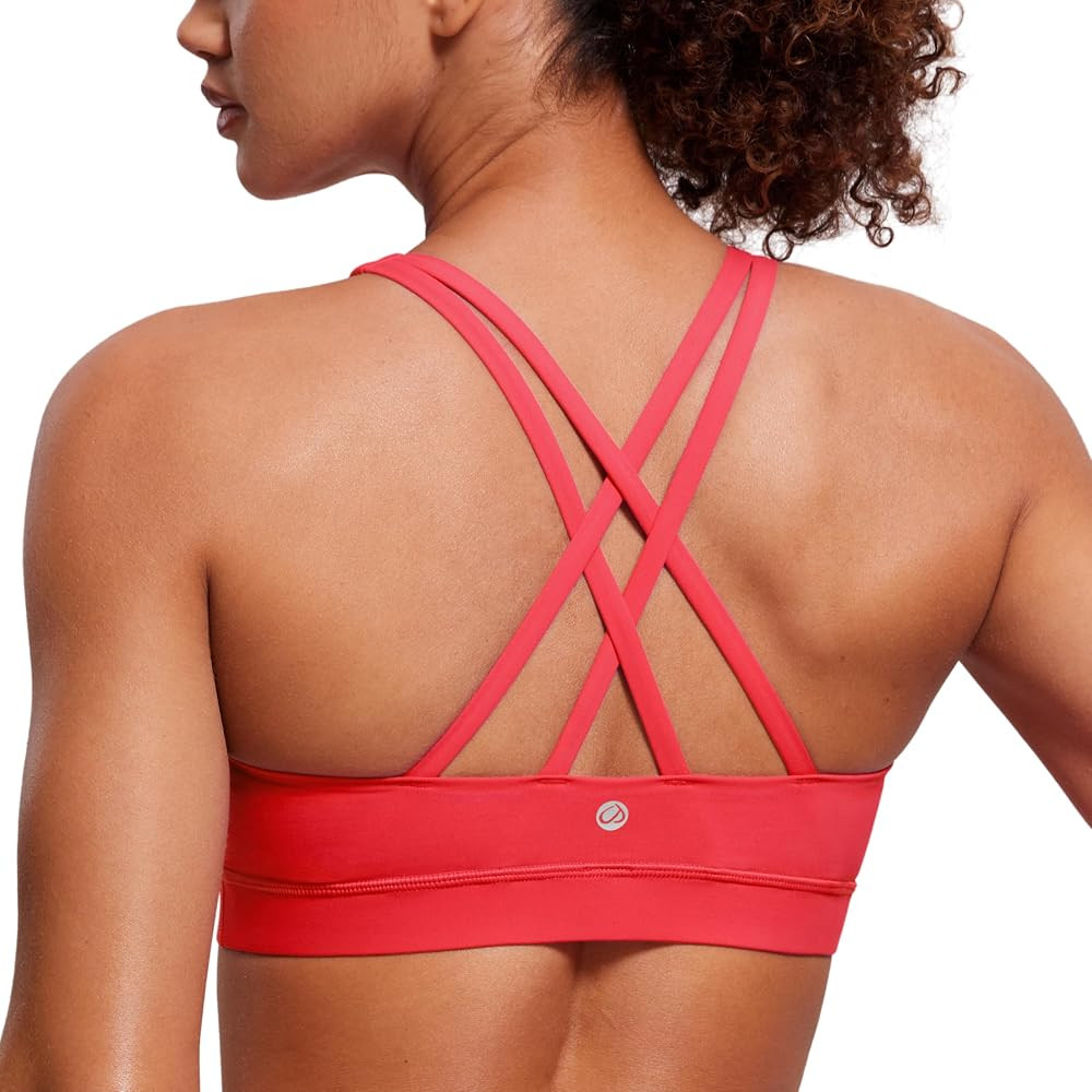 CRZ YOGA Women's Strappy Sports Bras Fitness Workout Padded Yoga Top Criss Cross Back Cami | Amazon (US)