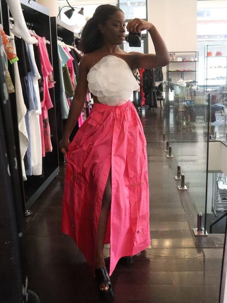 The same Cynthia Rowley rosette appliqué top, styled with a pink cargo maxi skirt.

#LTKstyletip #LTKSeasonal