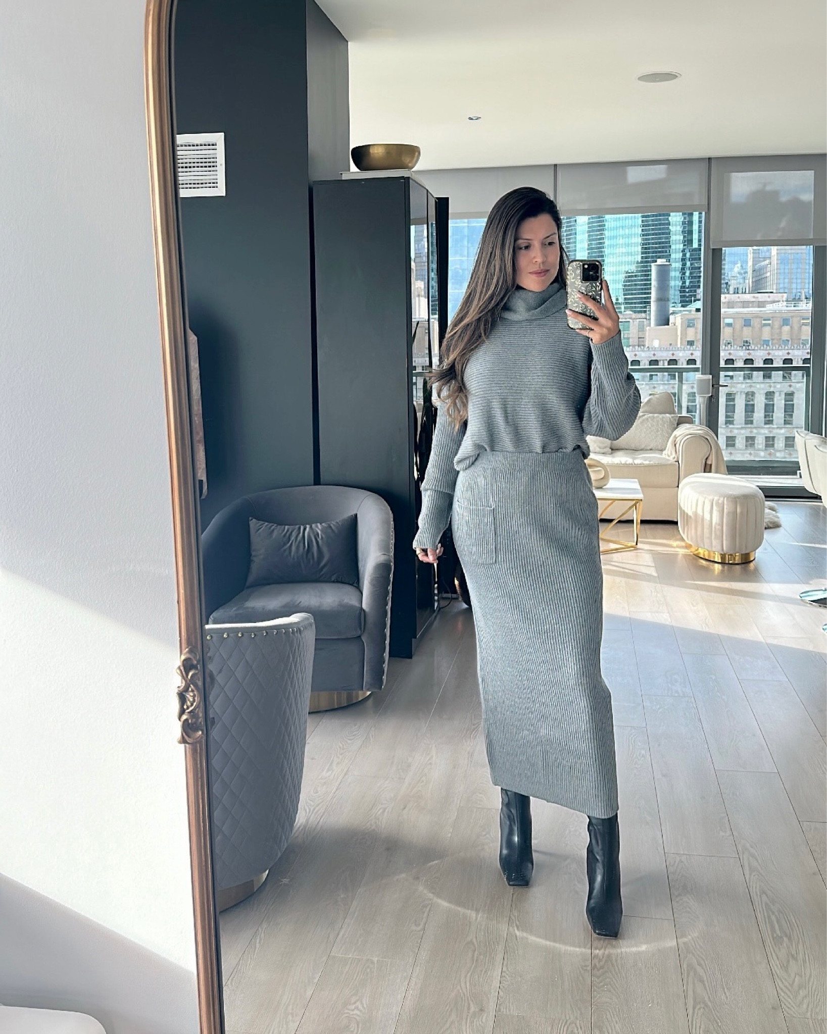 Two piece amazon set 
Black knee high boots 