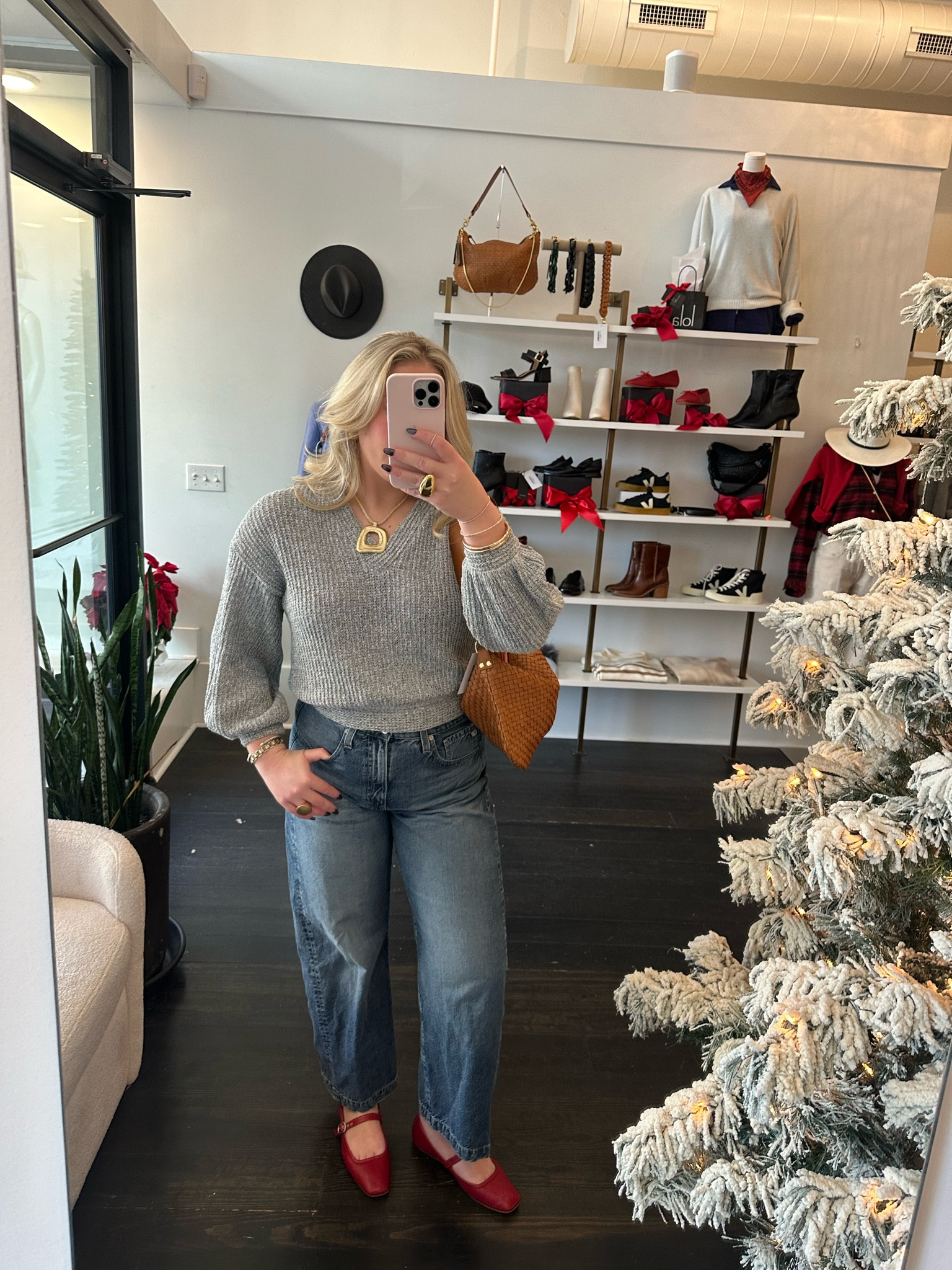 Love this sweater outfit to throw on for a comfy but elevated look! Love the pop of red with the red flats and the fun chunky necklace! Jeans are AG and are on sale! Sweater is old Anthro but tagged some similar fun styles! 

#LTKWorkwear #LTKHoliday #LTKFindsUnder100