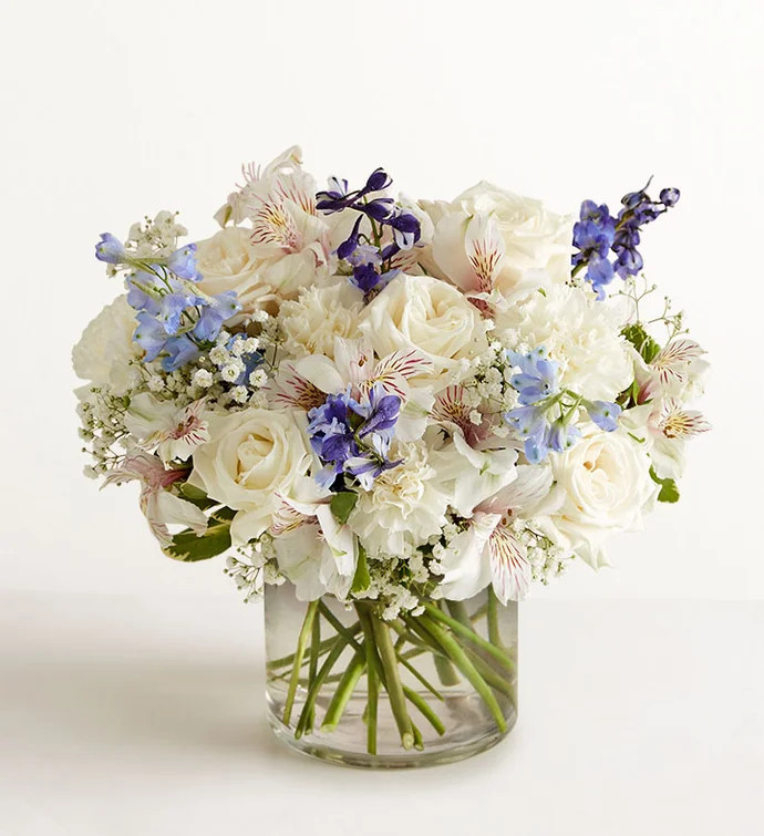 A loving sentiment can bring comfort during a time of loss. Our arrangement of blissful blue and ... | 1800flowers.com