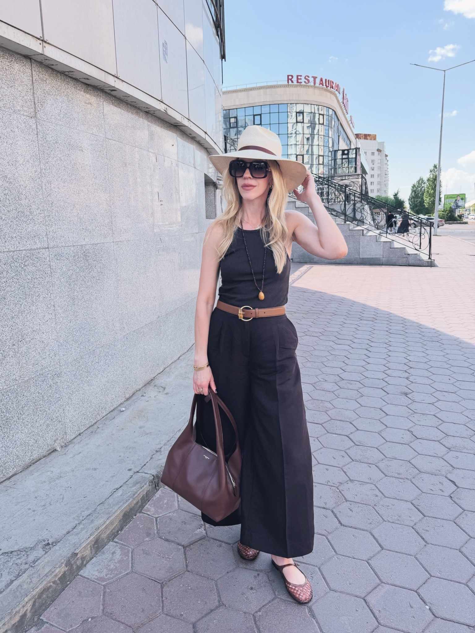 Summer outfit, vacation outfit, dark brown linen pants, @Janessa Leone straw hat, jelly shoes, Le Tanneur handbag

#LTKSeasonal #LTKTravel #LTKOver40