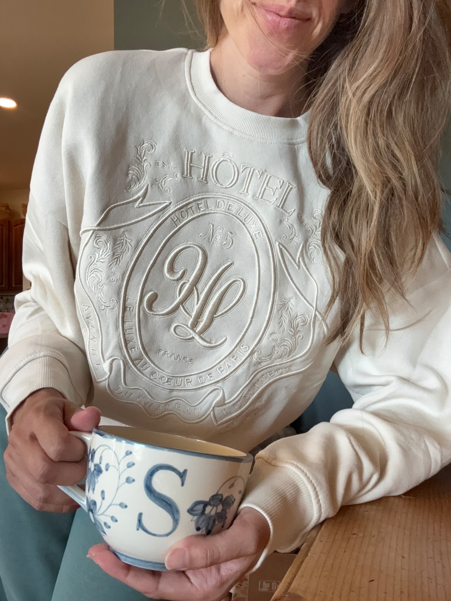 Cutest coziest sweatshirt for 25$! Looks so high end! #sweatshirt #sweater #embroidered 

#LTKmomlife #LTKootd #LTKSpringSale