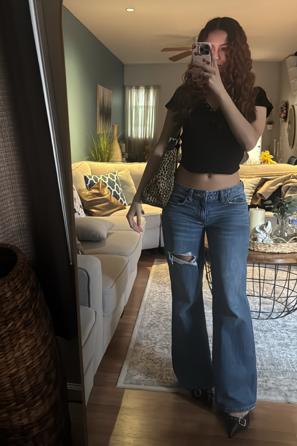 Black shirt, button up shirt, crop top, medium denim jeans, denim jeans, wide bottom jeans, pointy heels, black heels, kitten heels, cheetah bag, shoulder bag

#LTKFindsUnder100 #LTKFindsUnder50 #LTKStyleTip