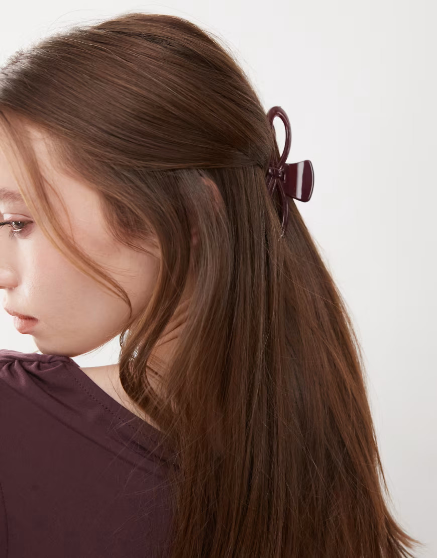 Reclaimed Vintage bow claw clip in burgundy red | ASOS (Global)