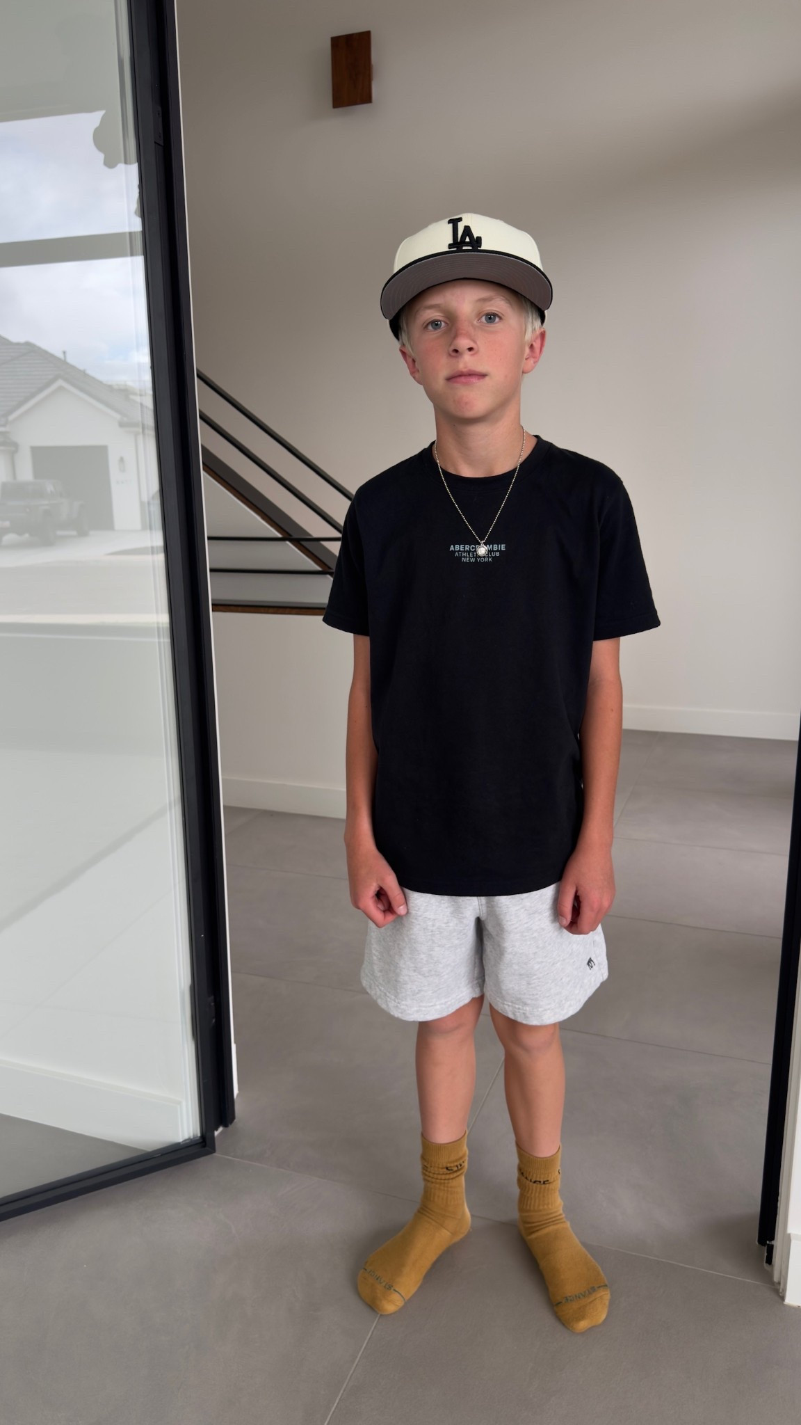 Shirt is sold out, but linked his favorite Abercrombie logo essential tee!