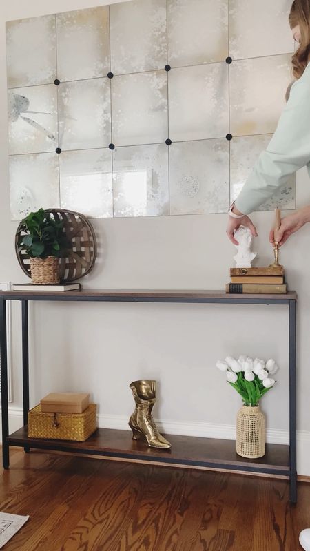 Getting my narrow console table for my living room styled for spring! I’m obsessed with the decor I used for this! A basket and fake plant, fake tulips, a vintage brass boot vase, old books, a bust vase, and brass candlesticks! What do you think of my home decor choices for Spring? 


Small spaces | small space furniture | Amazon finds | spring home decor | Walmart finds | thrifted finds | decorating for spring 

#LTKsalealert #LTKhome #LTKSeasonal