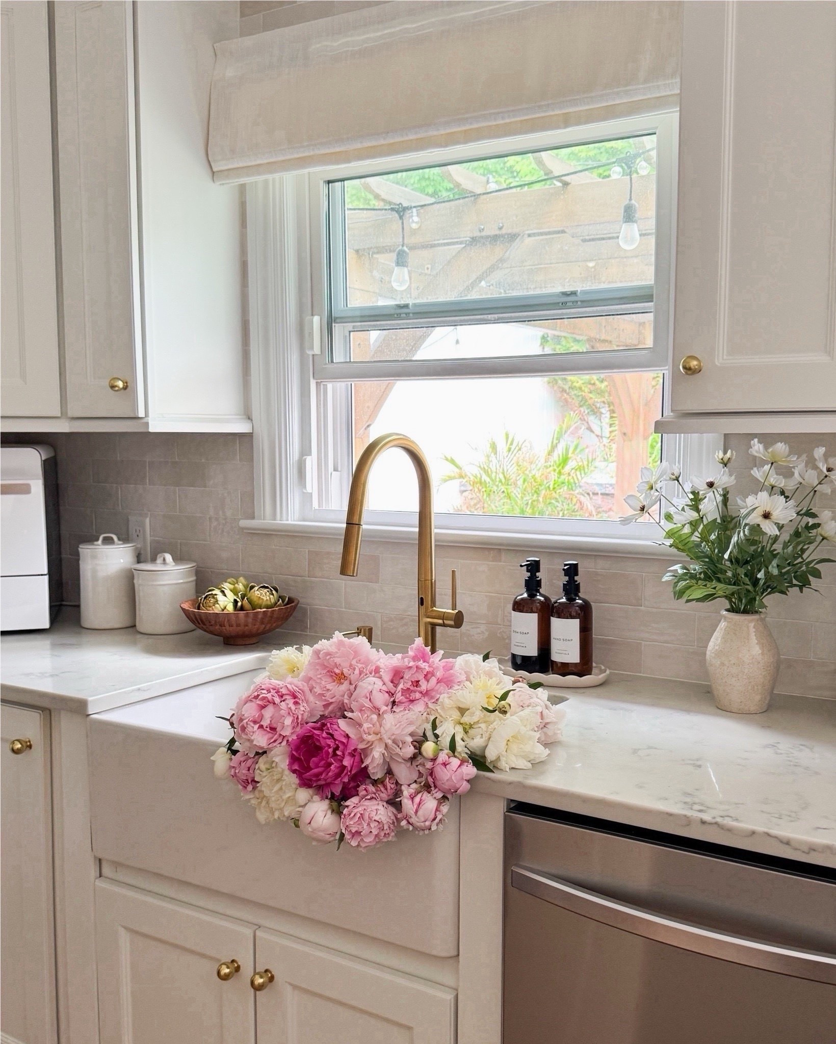 The creamy white cabinet color you’ve all been asking about & tile grout I I used to create the look: 

Grout: Arctic White 
Tile: Zellige looks for less tile from Home Depot & under $9 sq. ft

Linking below all of our kitchen sources including cabinet hardware, lighting, stools, decor, and more 💫

#swisscoffeepaint #benjaminmoorecolors #kitchenmakeover #neutralhome #modernorganicstyle #paintcolorinspo #cabinetpaint #LTKhome #cozykitchenvibes #warmwhitepaint



#LTKSaleAlert #LTKHome