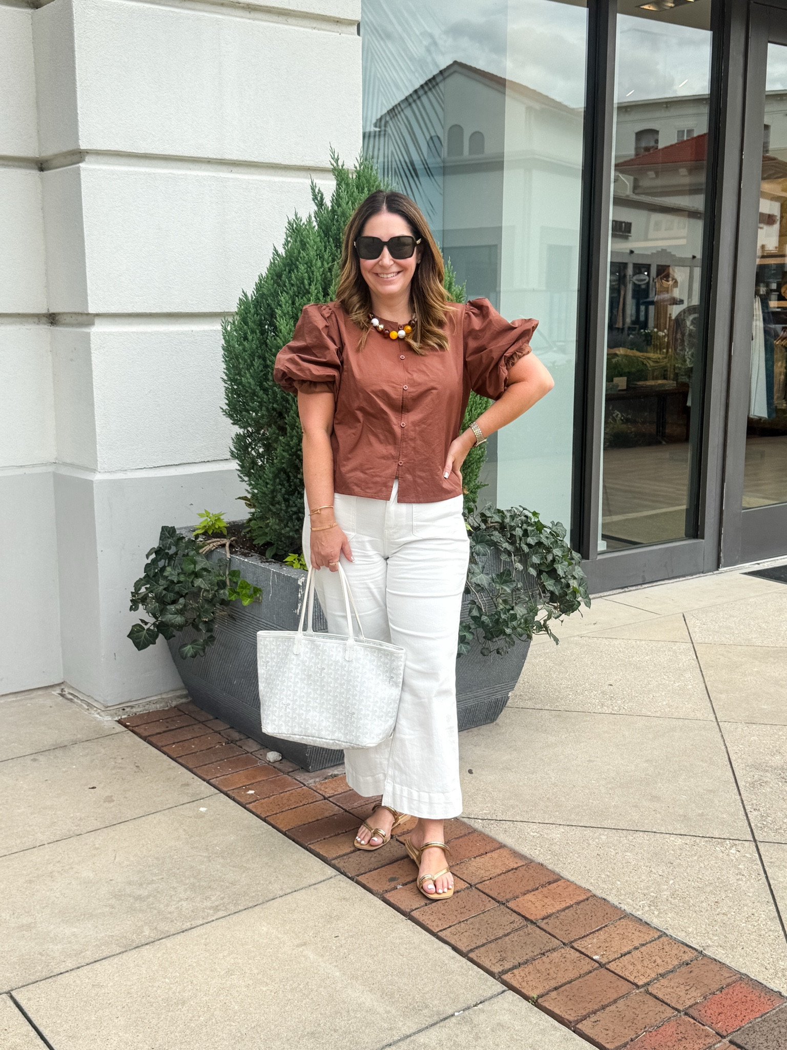 The prettiest puff sleeve top for a day out 🤎 I love the rich rust color and how the structured sleeves dress it up — paired with white wide-legs and slide sandals it's such an easy summer-to-fall look. Added a woven tote to keep it light and breezy.
📏 Wearing Lin the top, tts L in the jeans
#LTKstyletip #LTKfindsunder50

#LTKOver40 #LTKMidsize #LTKWorkwear