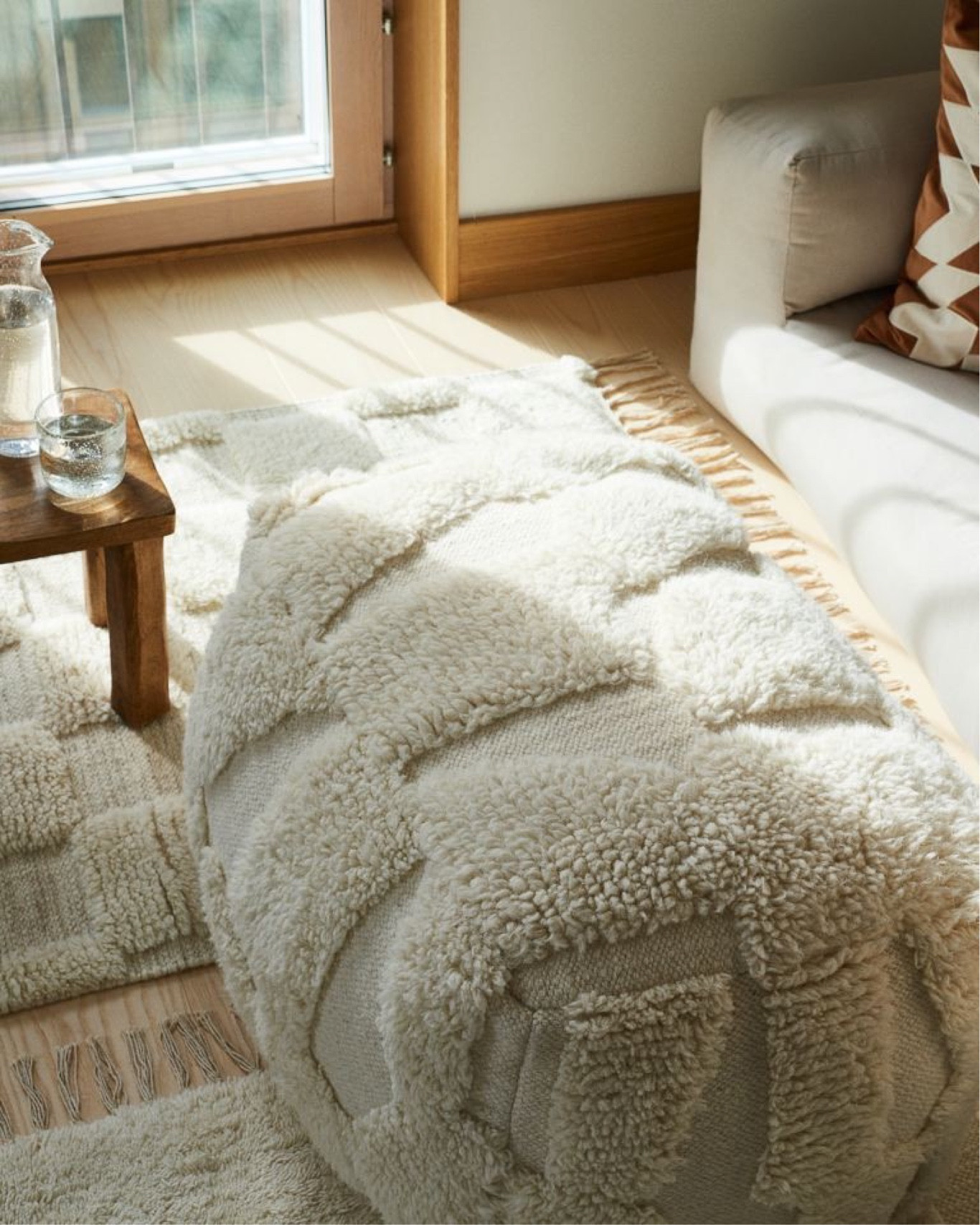 Creamy wool pouffe for cozy living room ideas. Affordable home decor.

#LTKhome