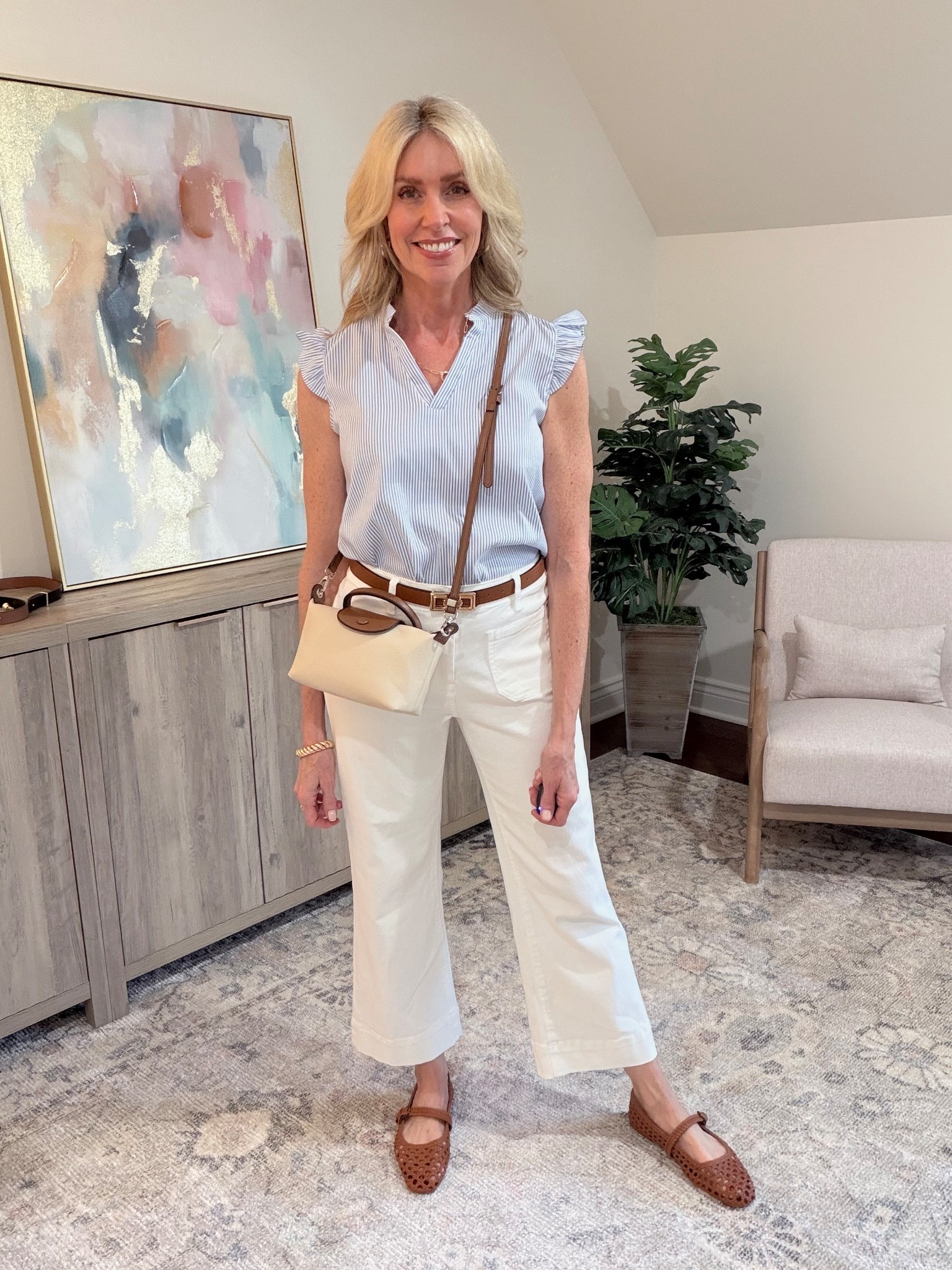 These Amazon wide leg jeans are super stretchy and comfortable without being oversized and baggy. The cropped length is perfect for spring! They come in many colors and 6 different size. I styled them with affordable Amazon pieces for spring. 

#LTKootd #LTKgrwm #LTKOver40