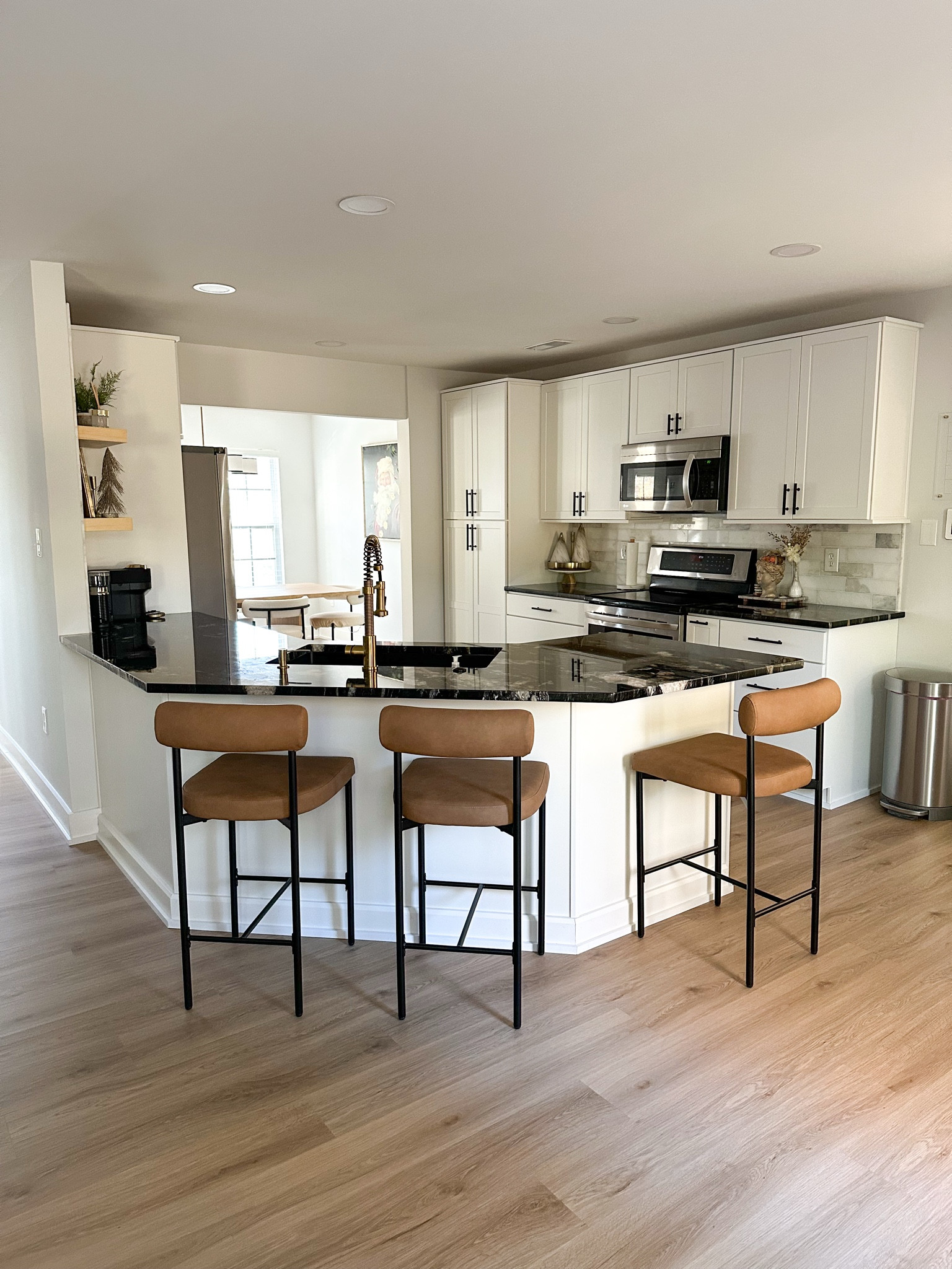 Nathan James faux Leather Counter Height Bar Stools Brown (Set of 3) in light brown-matte black. So comfy and great quality! Shipping was also 2 days 

Bar stools, kitchen chairs, dining chairs, modern bar stools 

#LTKWatchNow #LTKHome #LTKSaleAlert