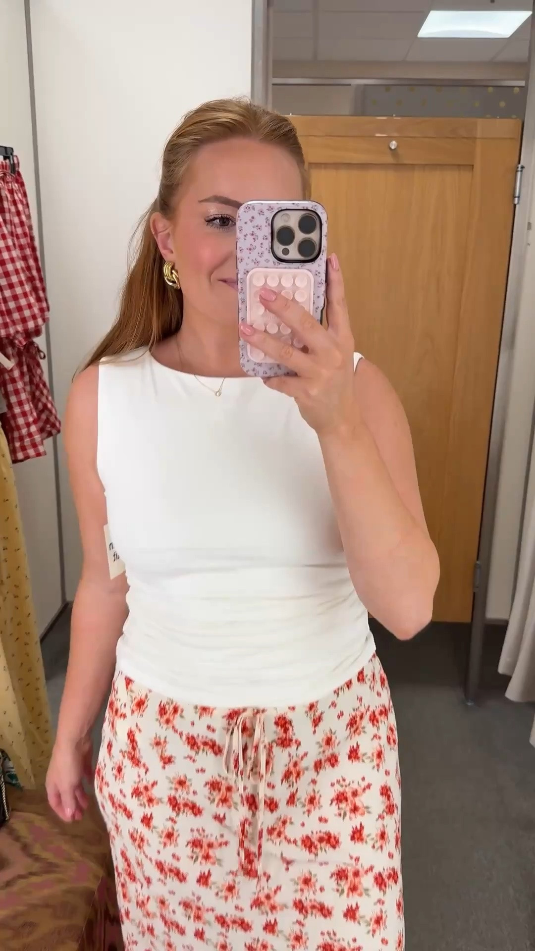 This floral skirt is such a versatile summer staple 🌸 Paired with a simple white tank, it creates an effortless look for brunch, church, vacation, or everyday wear.

#MidiSkirtStyle #SummerFashion #NordstromFinds #CasualChic #LTKStyle