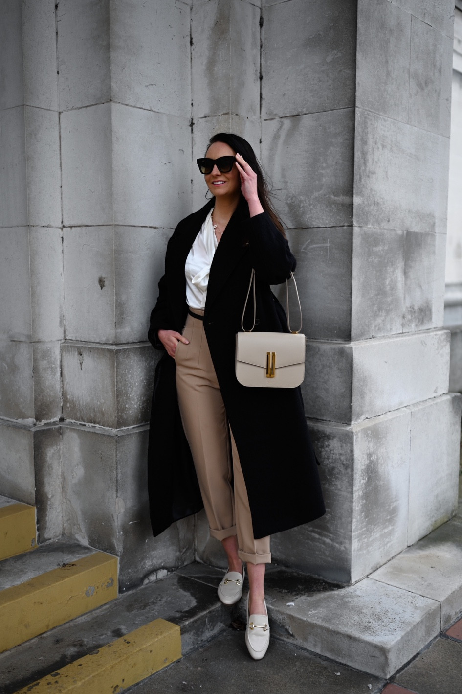 When in doubt keep it simple 🖤

Wearing the Vancouver cross body bag in a stunning taupe-coloured smooth leather from DeMellier London. Stone coloured trousers complimented with gold clasp black leather belt, on top a white silk bow tie blouse for added texture. 

Wrapped up in Other Stories belted wool coat in black. The look is completed with some neutral sophisticated leather loafers. 

USE CODE stephs12 FOR 12% OFF on Lilysilk.com

#DeMellierLondon #DeMellierBag #Luxury #LuxuryHandbag #LuxuryCrossbodyBag #Taupe #TaupeBag #LuxuryStyling #ootd #designerbag #springoutfit

#LTKstyletip #LTKSeasonal #LTKitbag
