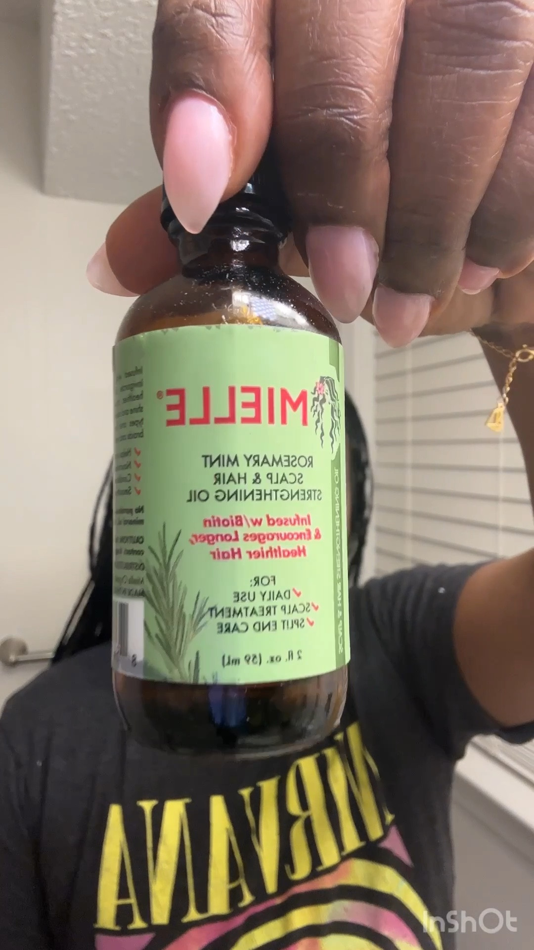 Quickly oiling my scalp with Mielle rosemary mint hair oil  

#LTKOver40 #LTKBeauty #LTKdayinmylife