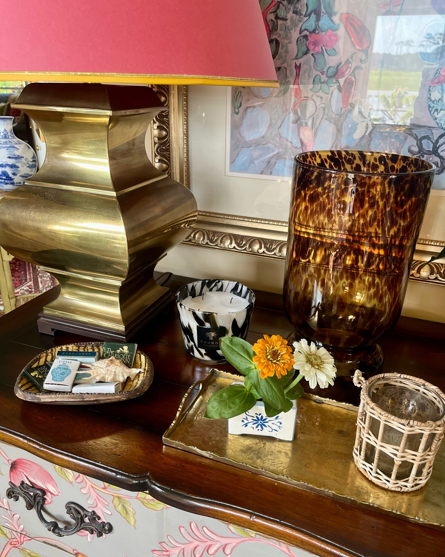 For scale, here’s a different view of the tiny flower frog! Linking some other options for similar brass trays, tortoise glass bases, plus my favorite Baobab candle. 

#LTKHome #LTKSeasonal #LTKStyleTip