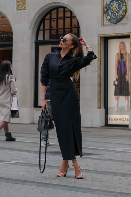 - black midaxi pencil skirt
- black shirt 
- black aviator sunglasses

#LTKstyletip #LTKSeasonal #LTKworkwear
