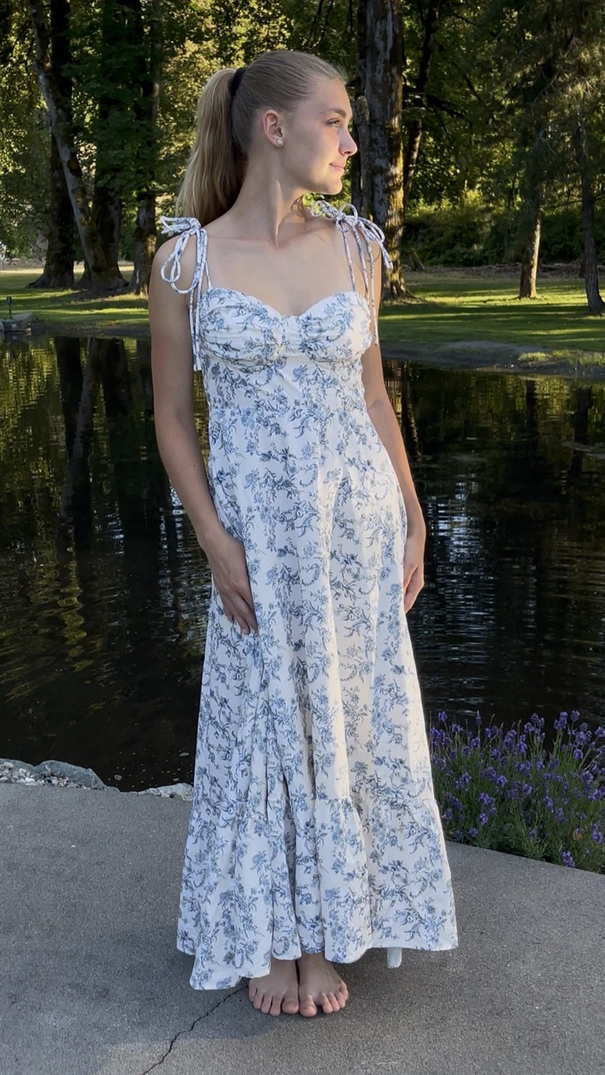 Blue and white floral long summer dress with shoulder tie straps. Our daughter here is wearing this to an upcoming wedding rehearsal dinner as approved by the bride.🥰

#LTKWedding