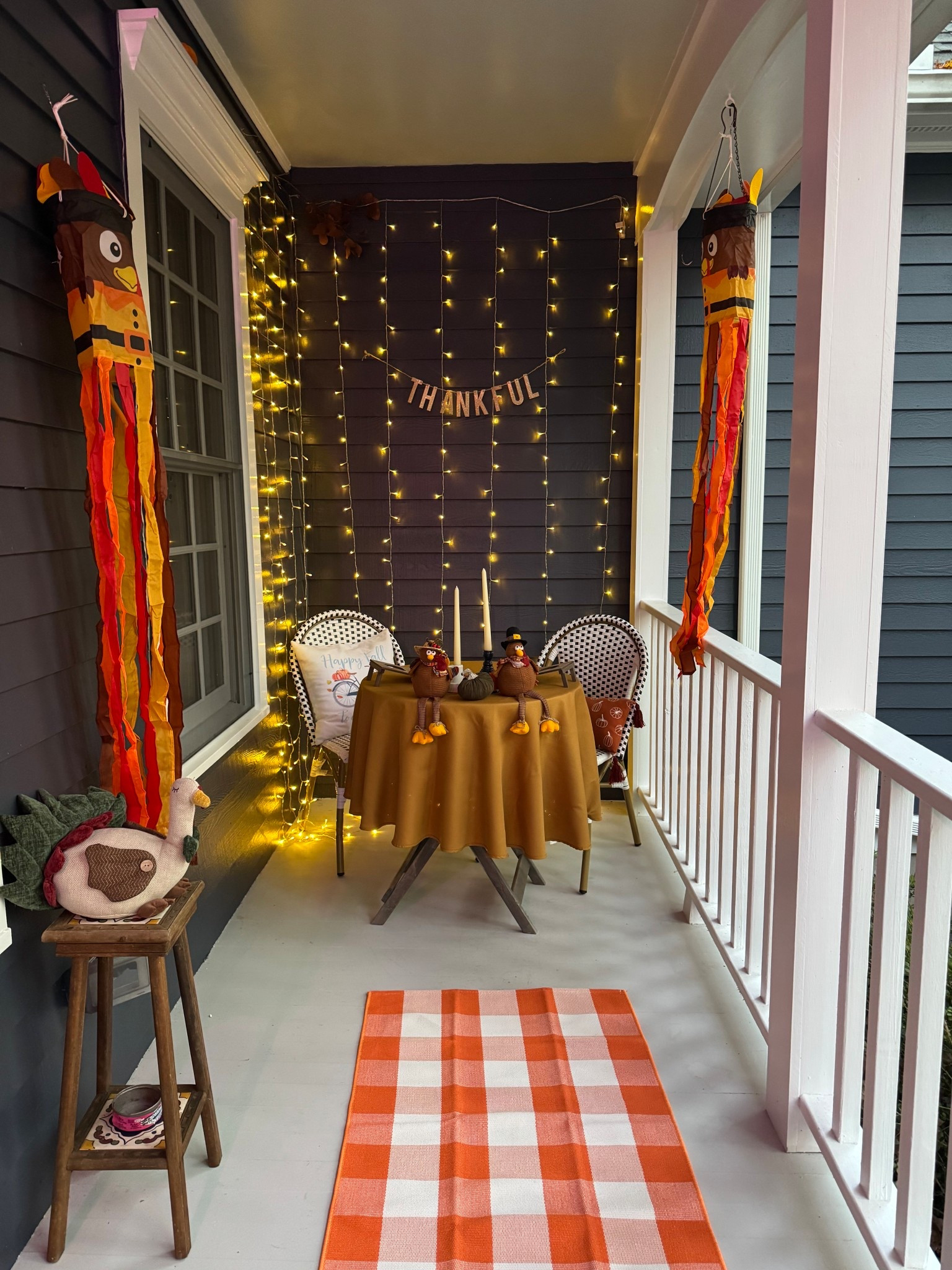 Thanksgiving porch decor! 
Checkered rug, turkeys and curtain lights 🧡

#LTKHoliday #LTKHome #LTKSeasonal