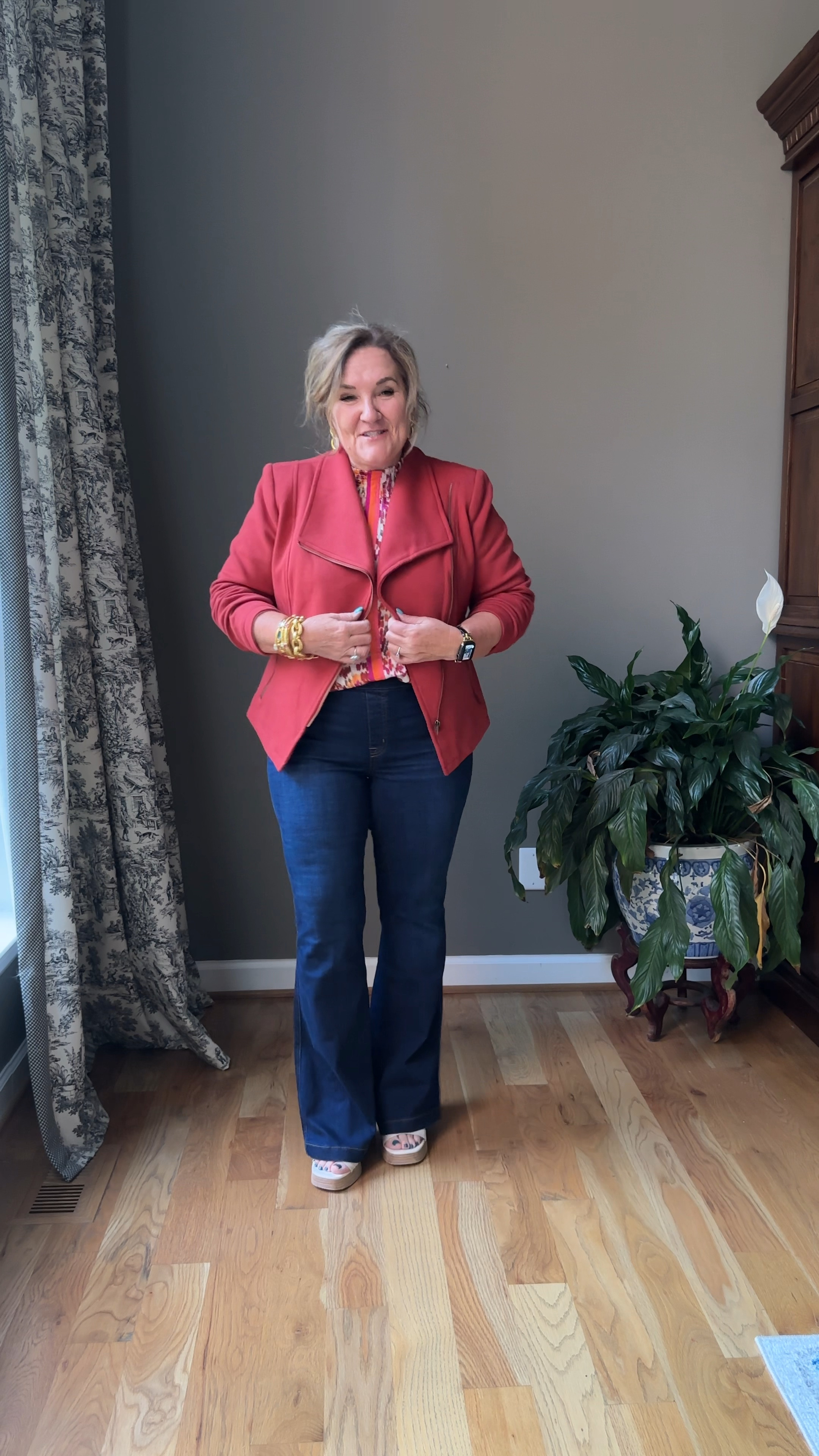 Moto jacket in ginger. It’s like a brick red persimmon color. Wearing an XL 30% off with code NANETTE30 through 10/2
Blouse size XL pretty fall colors. 15% off code NANETTE15 
These flares are ALL THAT! Wearing a size XL petite and they are meant to wear with heels. 10% off and free shipping with code NANETTEXSPANX 

Office outfit fall outfit 

#LTKsalealert #LTKSeasonal #LTKVideo